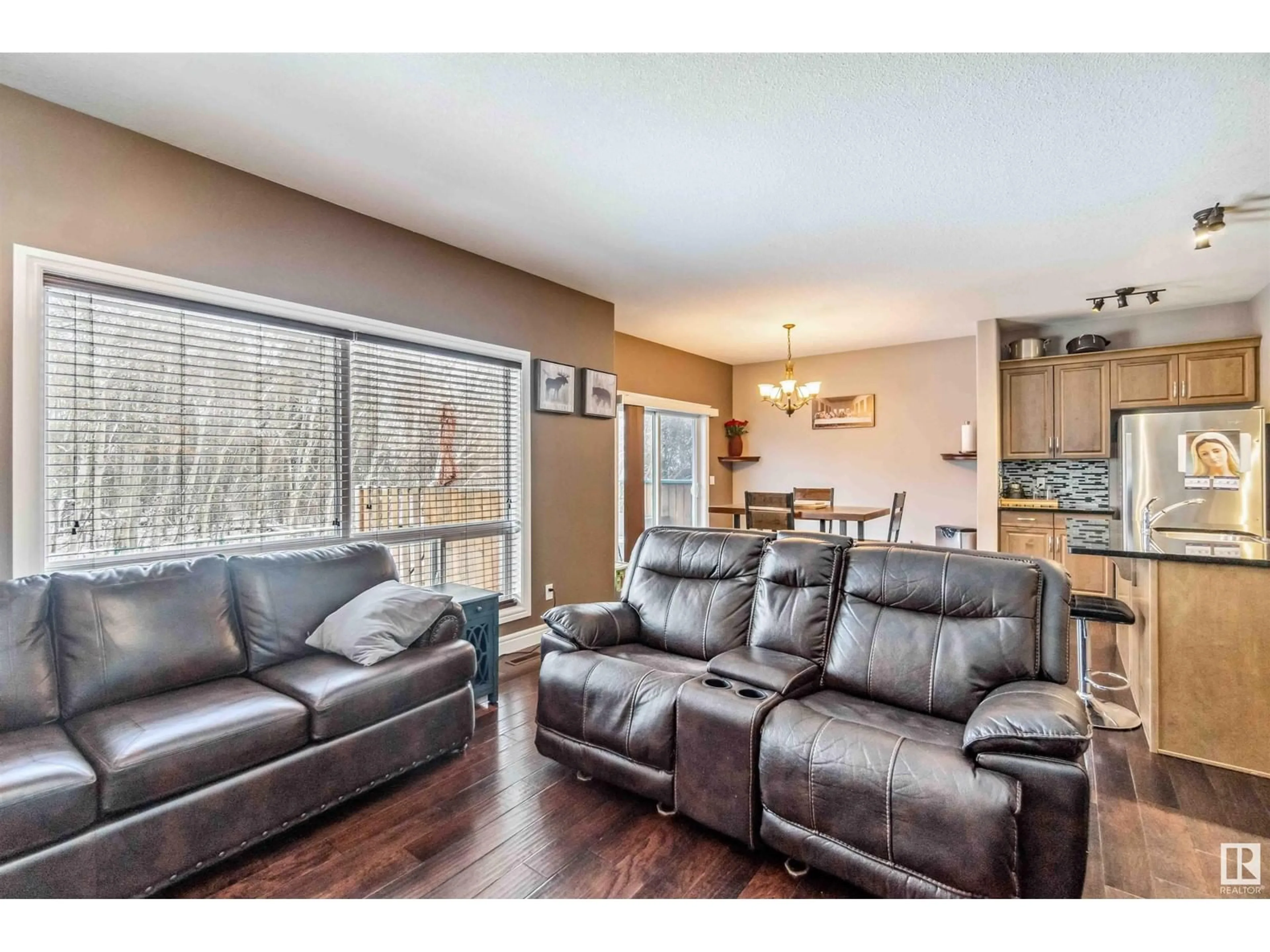 Living room with furniture, wood/laminate floor for 4107 50 ST, Gibbons Alberta T0A1N0