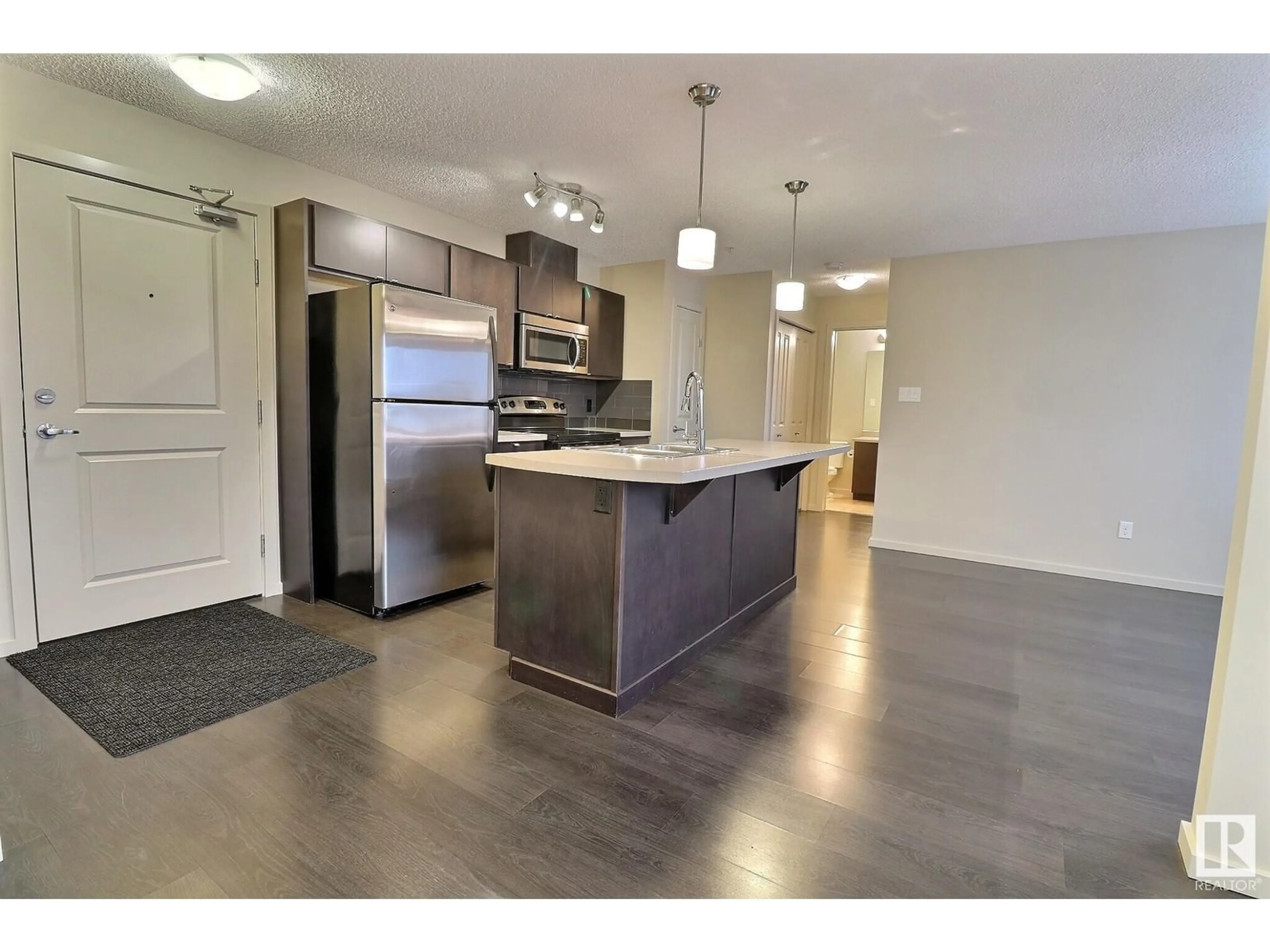 Open concept kitchen, unknown for #347 1196 HYNDMAN RD NW, Edmonton Alberta T5W0A2