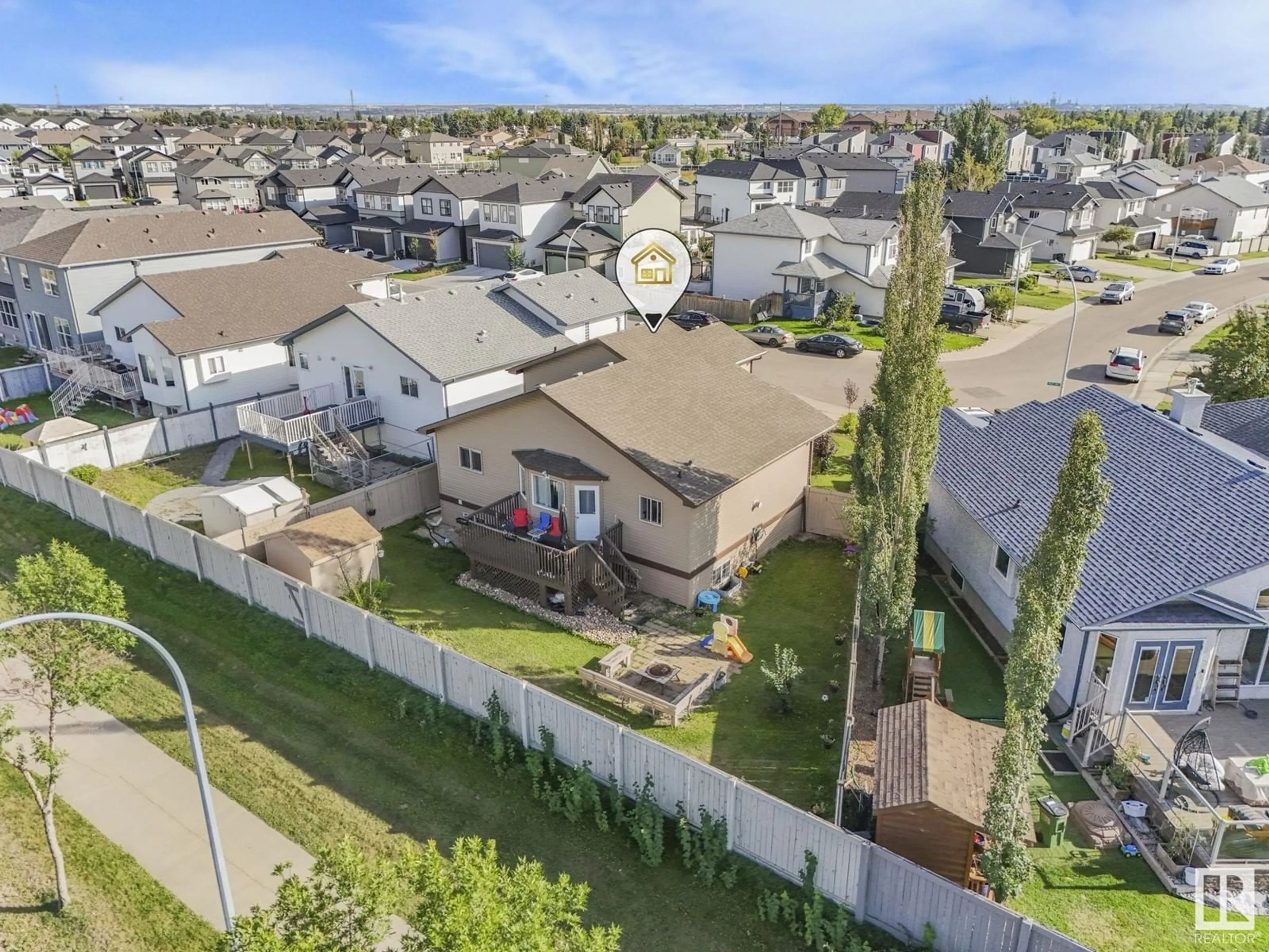 A pic from outside/outdoor area/front of a property/back of a property/a pic from drone, mountain view for 2856 152 Avenue NW, Edmonton Alberta T5Y2Y8