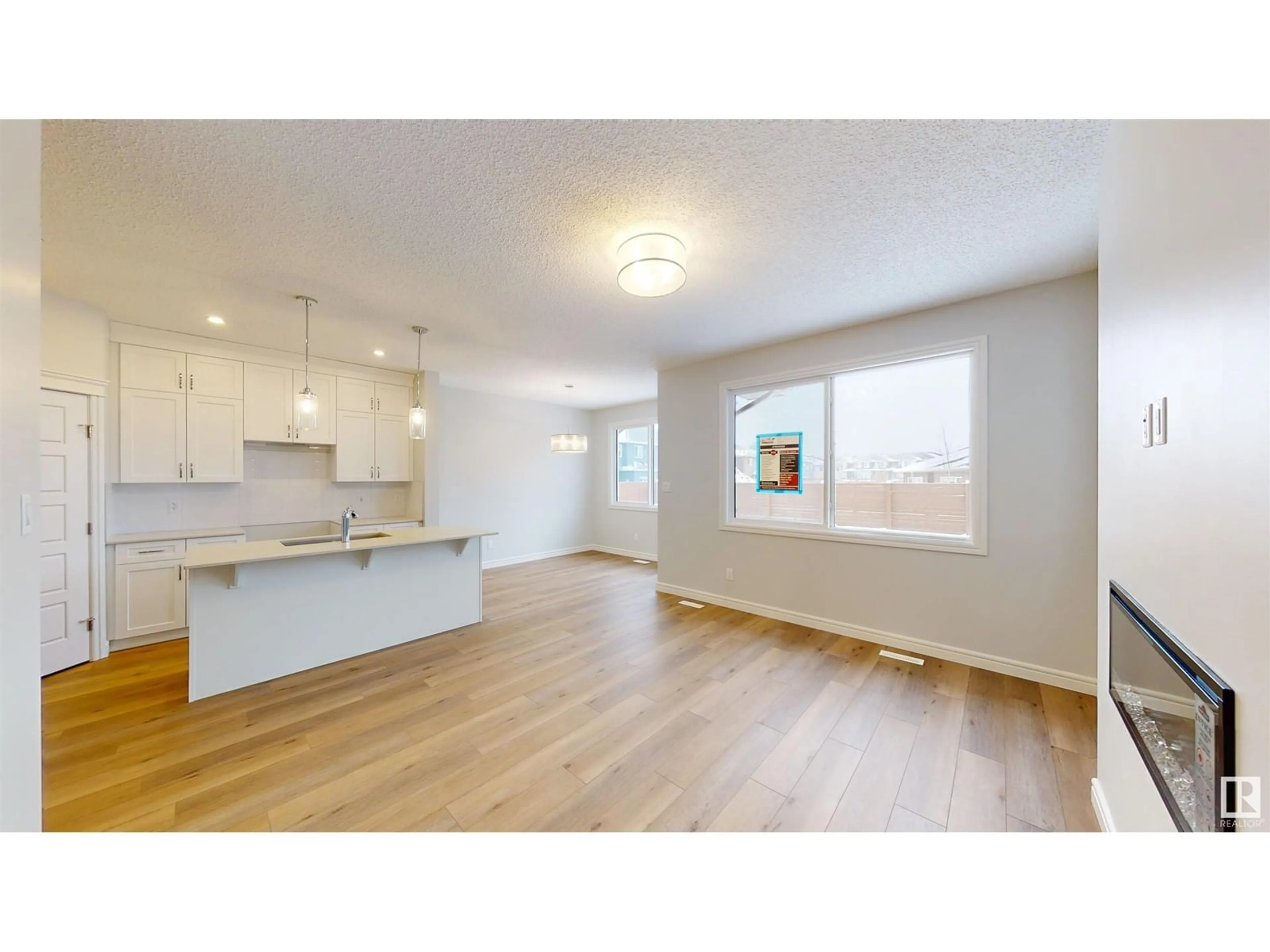 Open concept kitchen, wood/laminate floor for 1709 WESTERRA WD, Stony Plain Alberta T7Z0P1