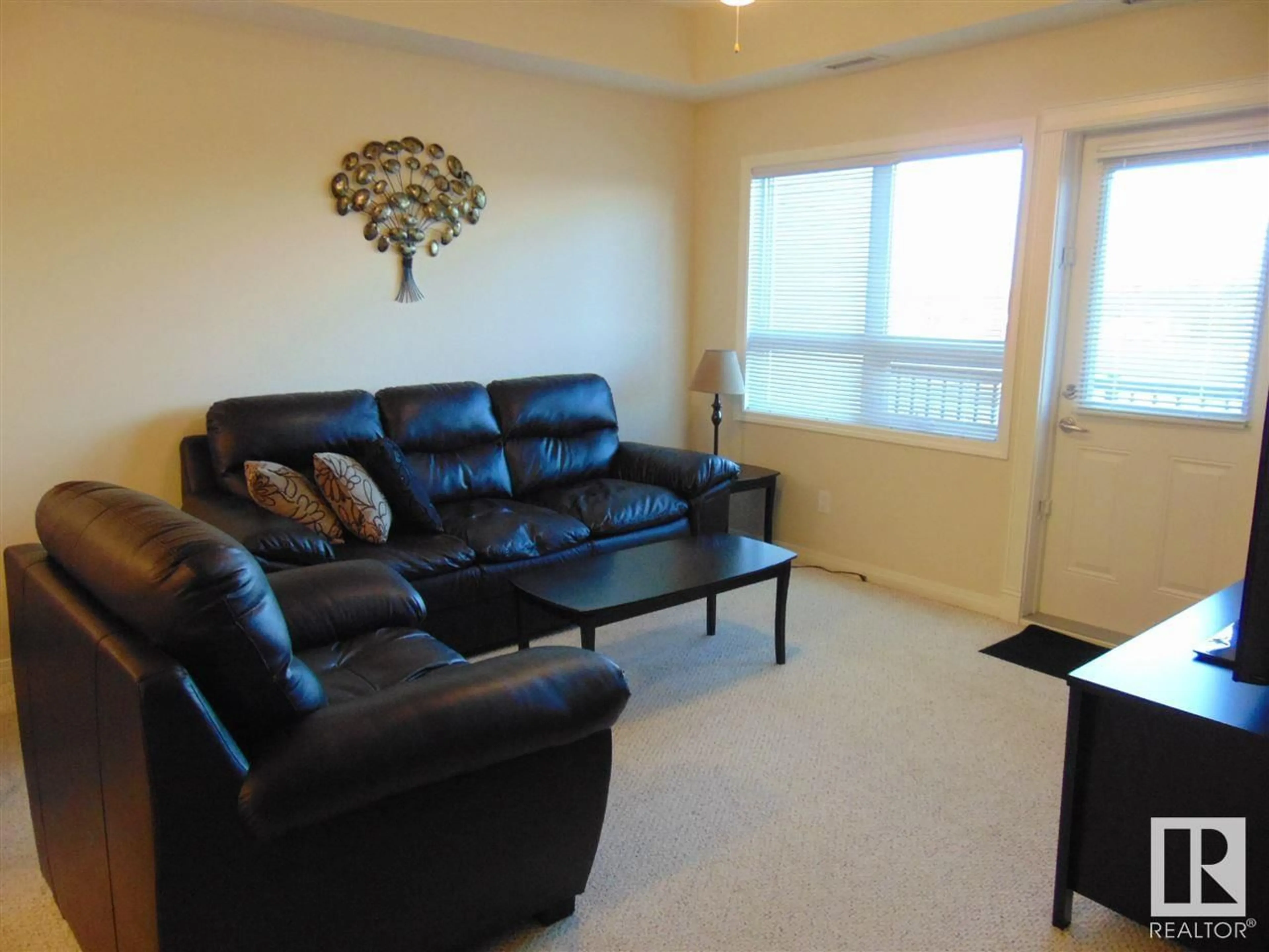 Living room with furniture, unknown for #313 8702 SOUTHFORT DR, Fort Saskatchewan Alberta T8L4R6