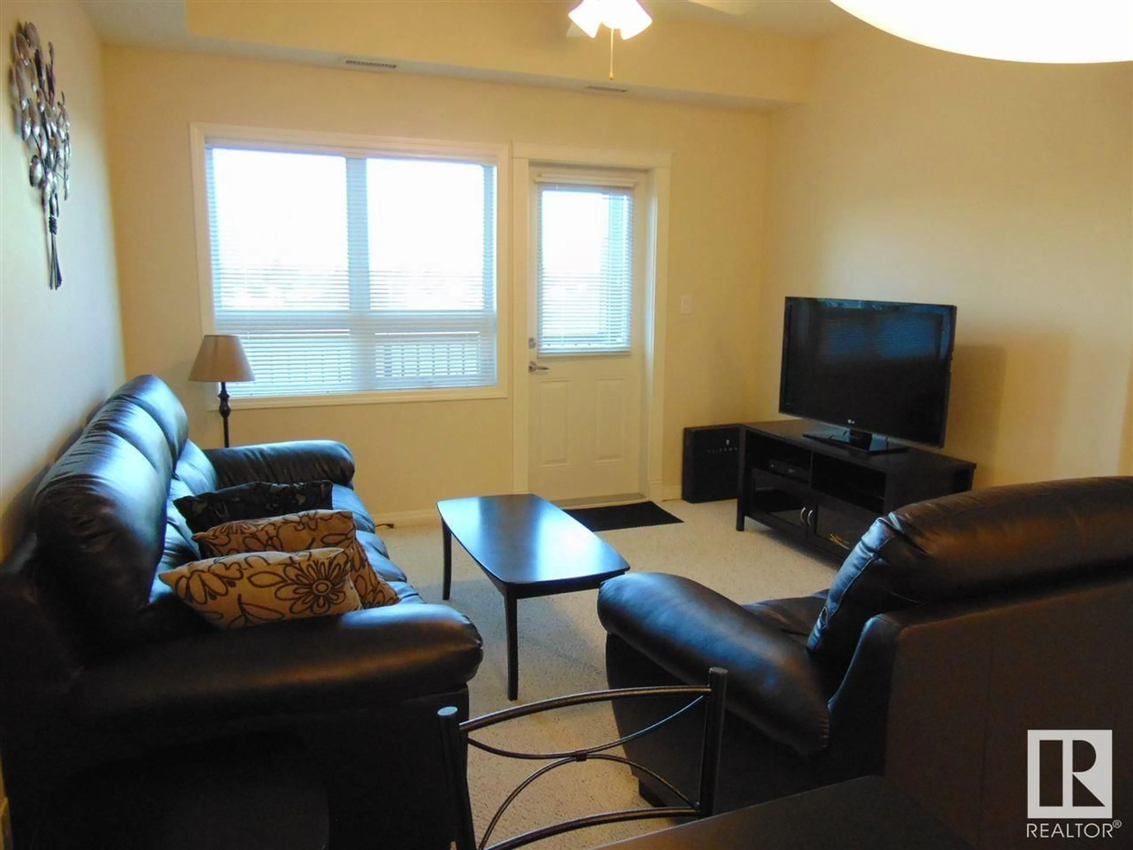 Living room with furniture, unknown for #313 8702 SOUTHFORT DR, Fort Saskatchewan Alberta T8L4R6