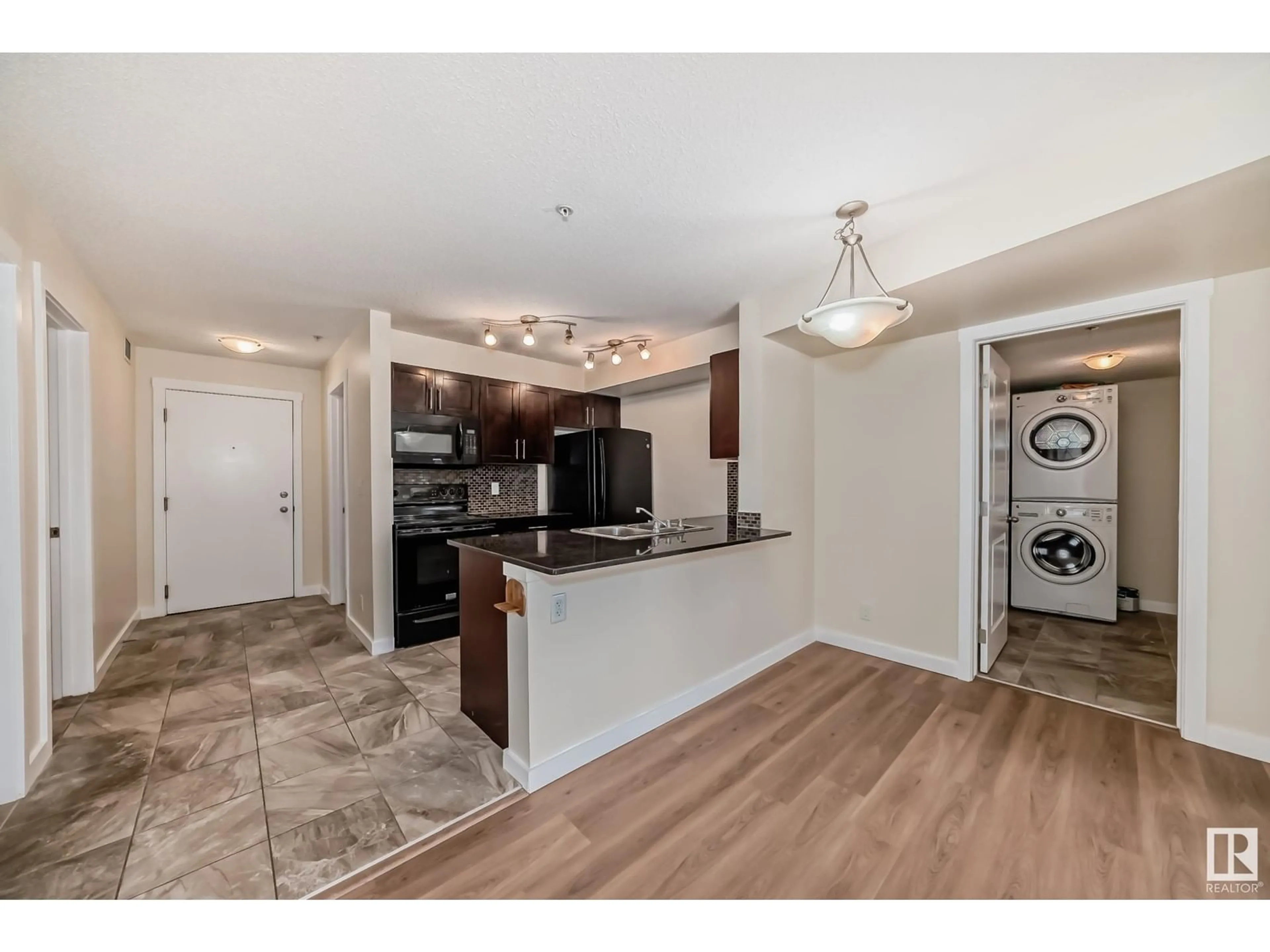 Open concept kitchen, unknown for #207 5370 CHAPPELLE RD SW, Edmonton Alberta T6W3L5