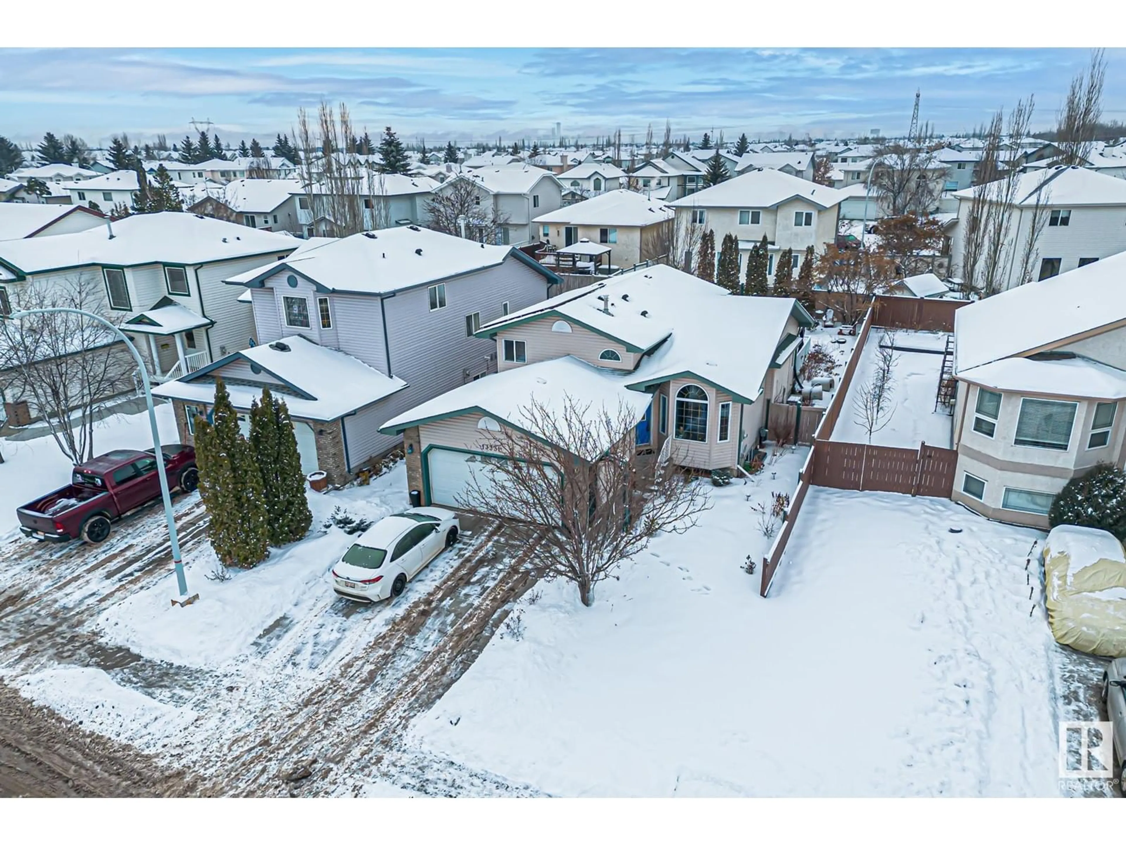 A pic from outside/outdoor area/front of a property/back of a property/a pic from drone, mountain view for 13331 155 AV NW, Edmonton Alberta T6V1K5