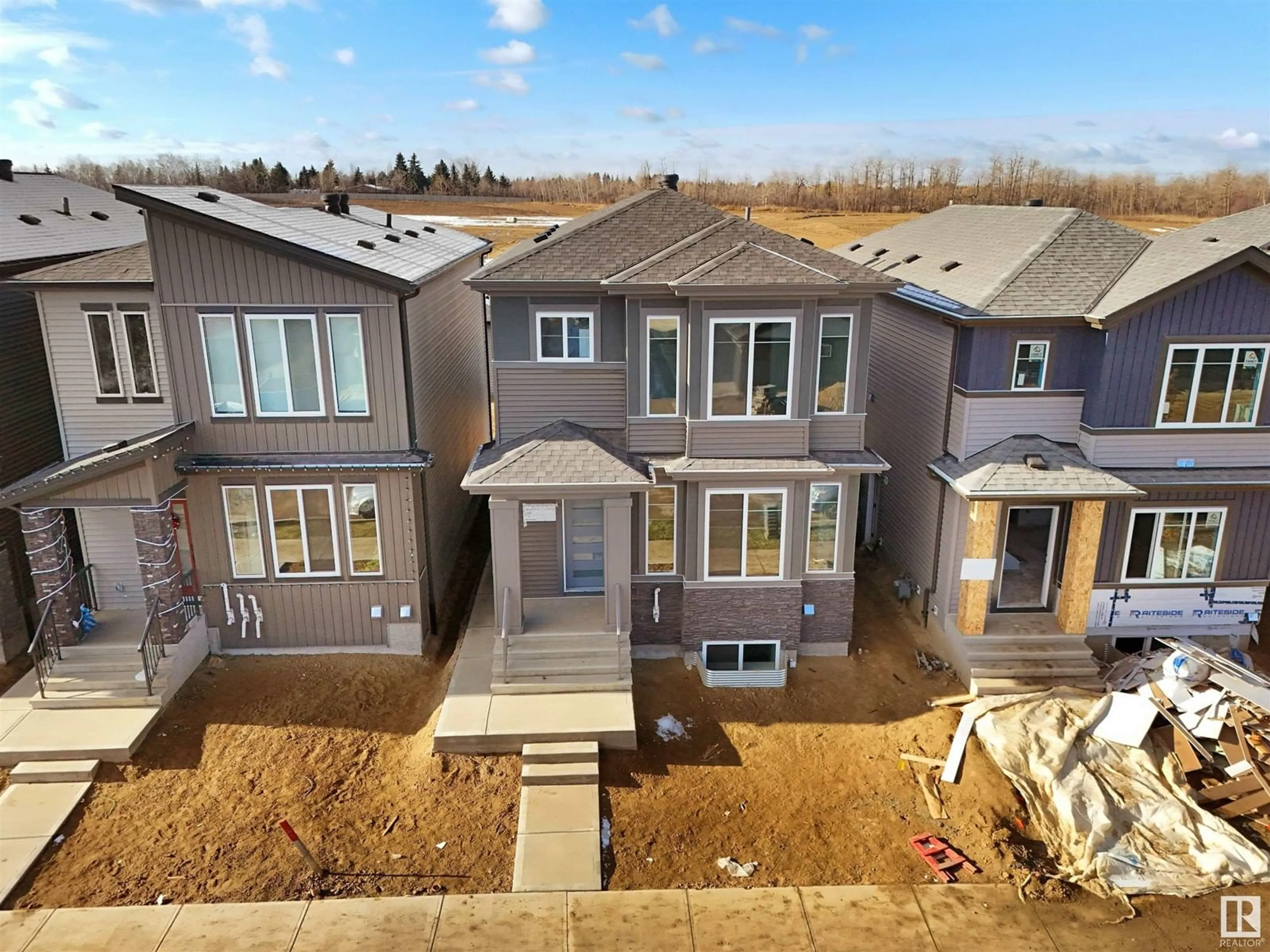 A pic from outside/outdoor area/front of a property/back of a property/a pic from drone, street for 1512 SISKIN LINK LI NW, Edmonton Alberta T5S0S6