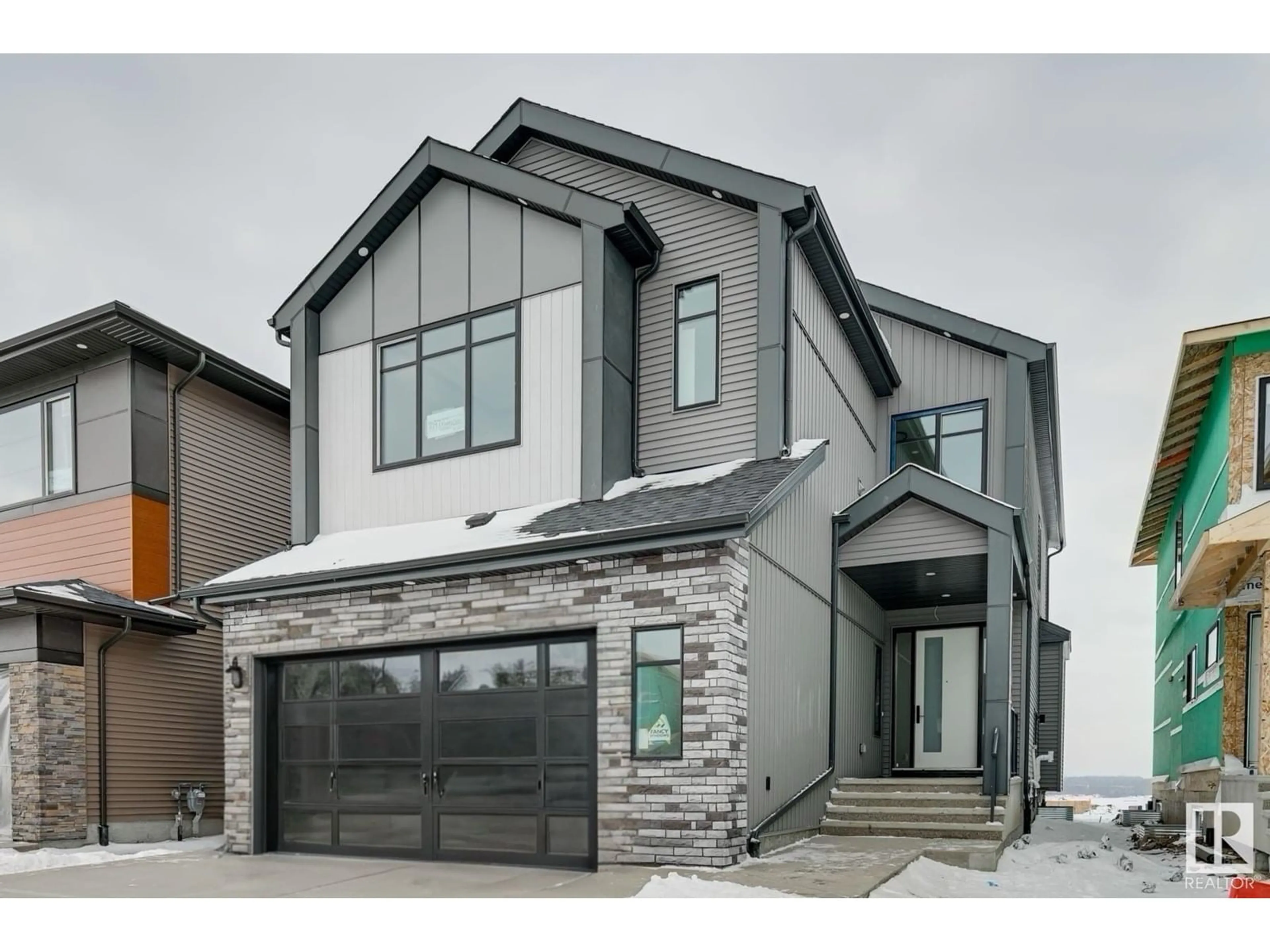 Home with brick exterior material, street for 7097 KIVIAQ CR SW, Edmonton Alberta T6W5N7