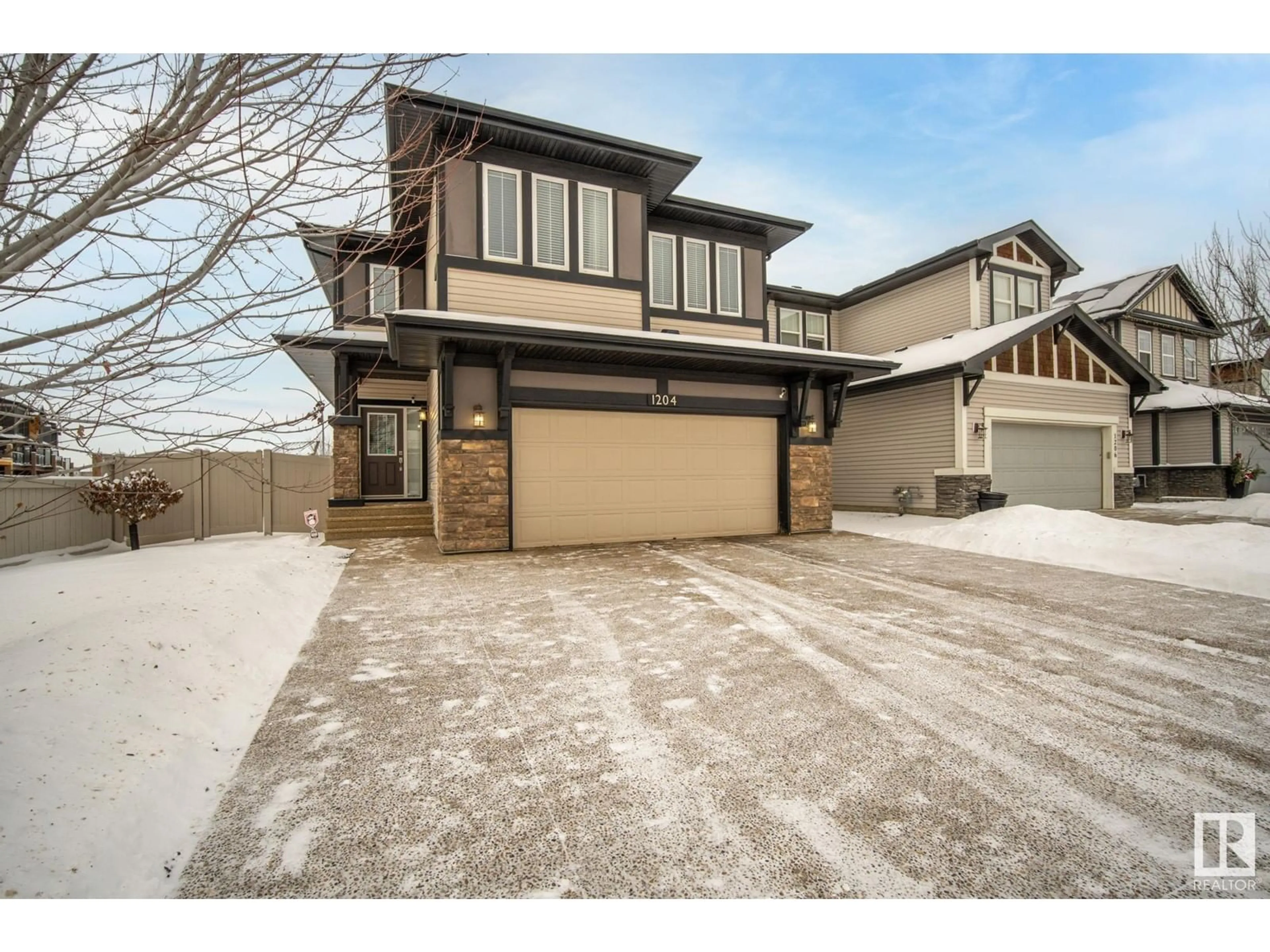 Home with brick exterior material, street for 1204 SECORD LANDING NW, Edmonton Alberta T5T4N3