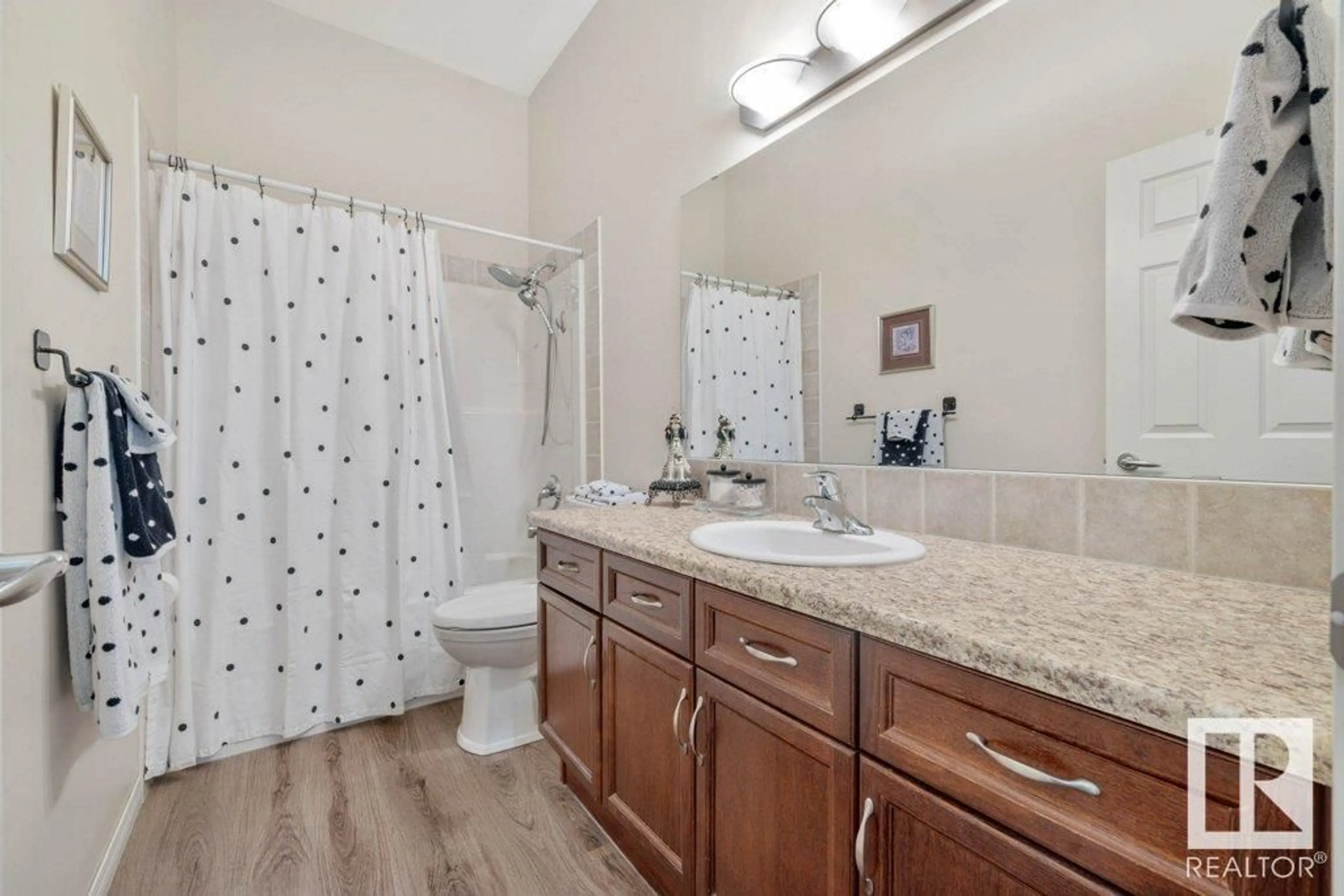 Standard bathroom, ceramic/tile floor for #107 8702 SOUTHFORT DR, Fort Saskatchewan Alberta T8L4R6