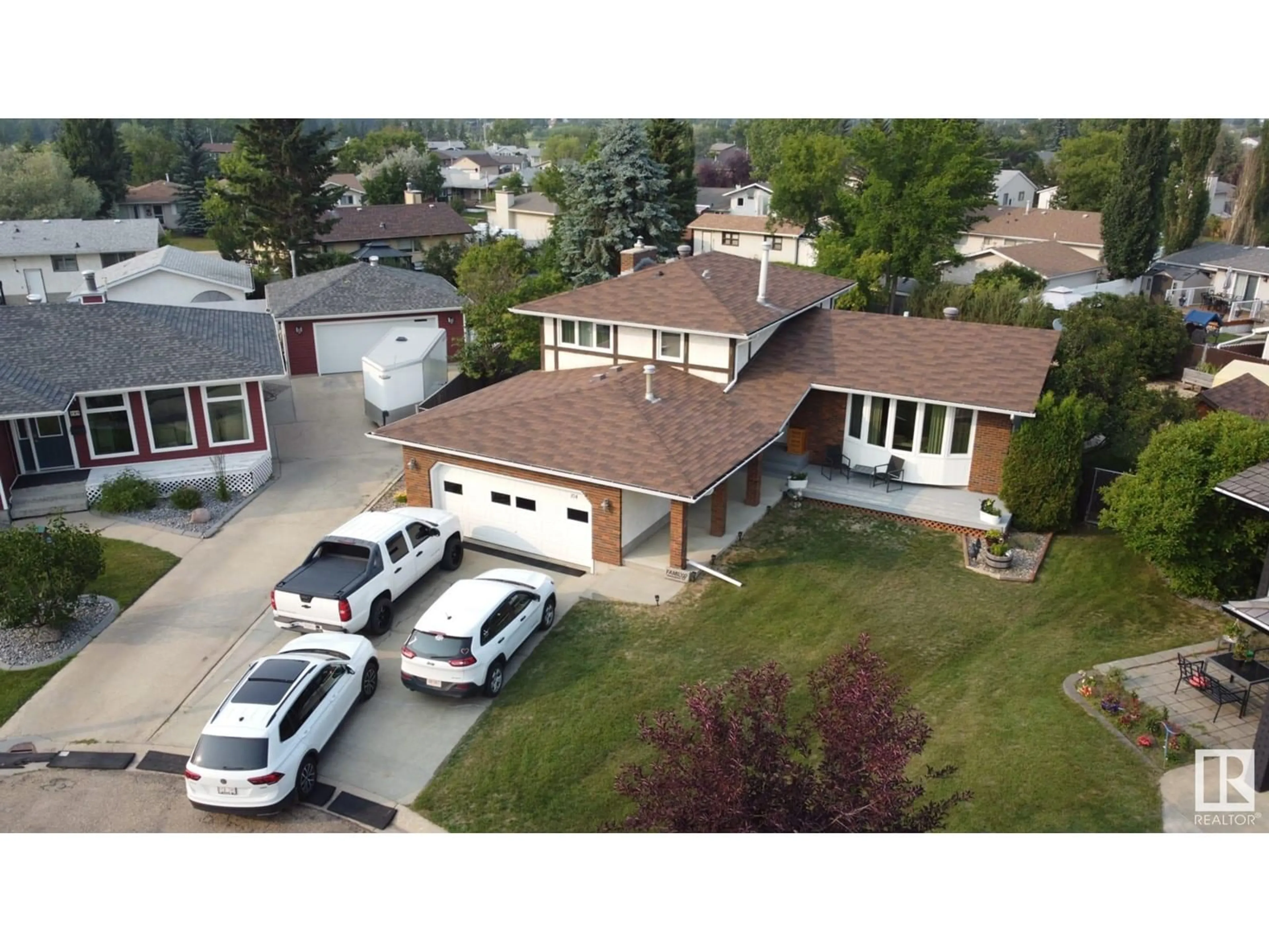 A pic from outside/outdoor area/front of a property/back of a property/a pic from drone, street for 104 HILLSIDE CO, Millet Alberta T0C1Z0