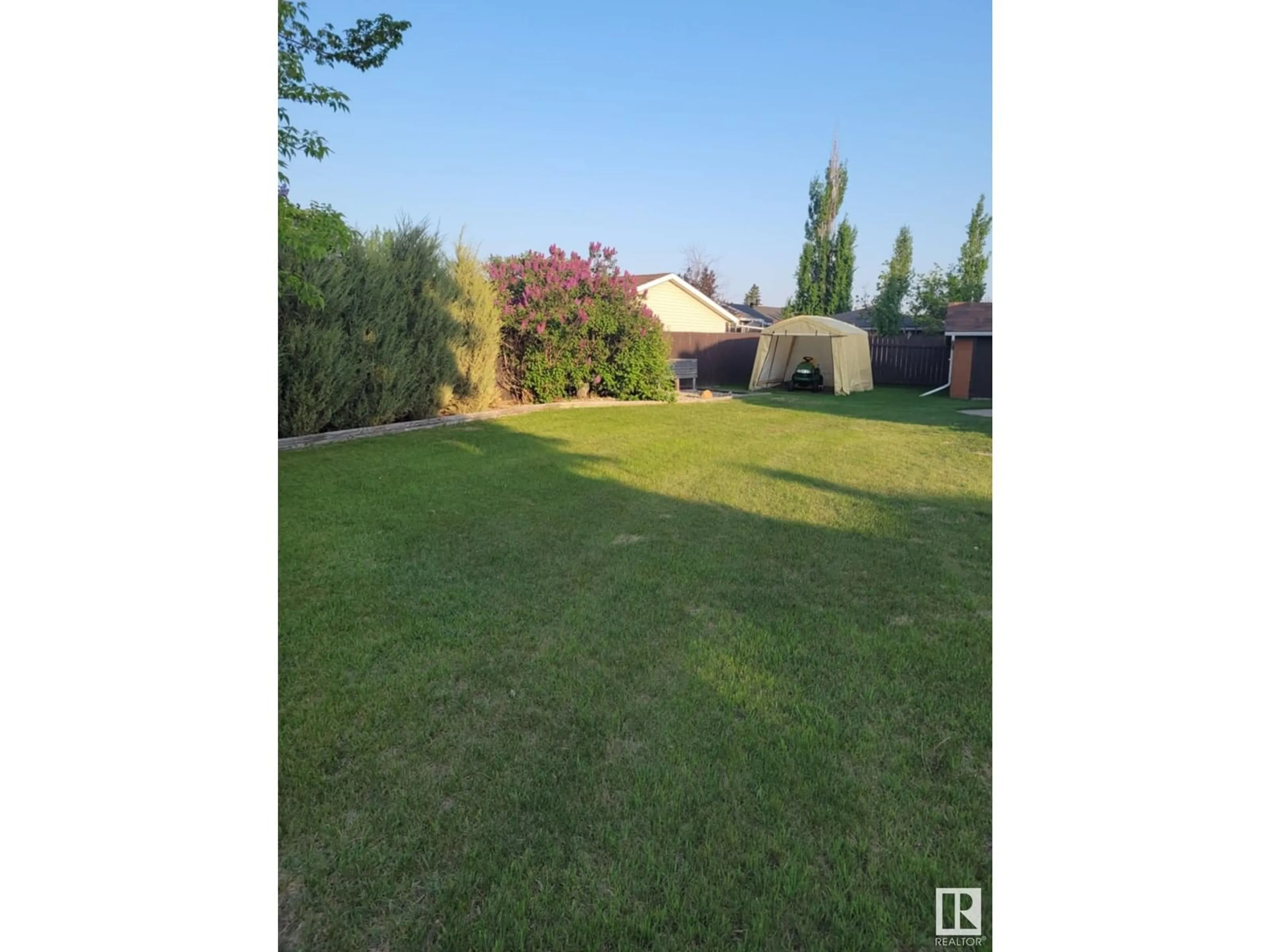 A pic from outside/outdoor area/front of a property/back of a property/a pic from drone, forest/trees view for 104 HILLSIDE CO, Millet Alberta T0C1Z0