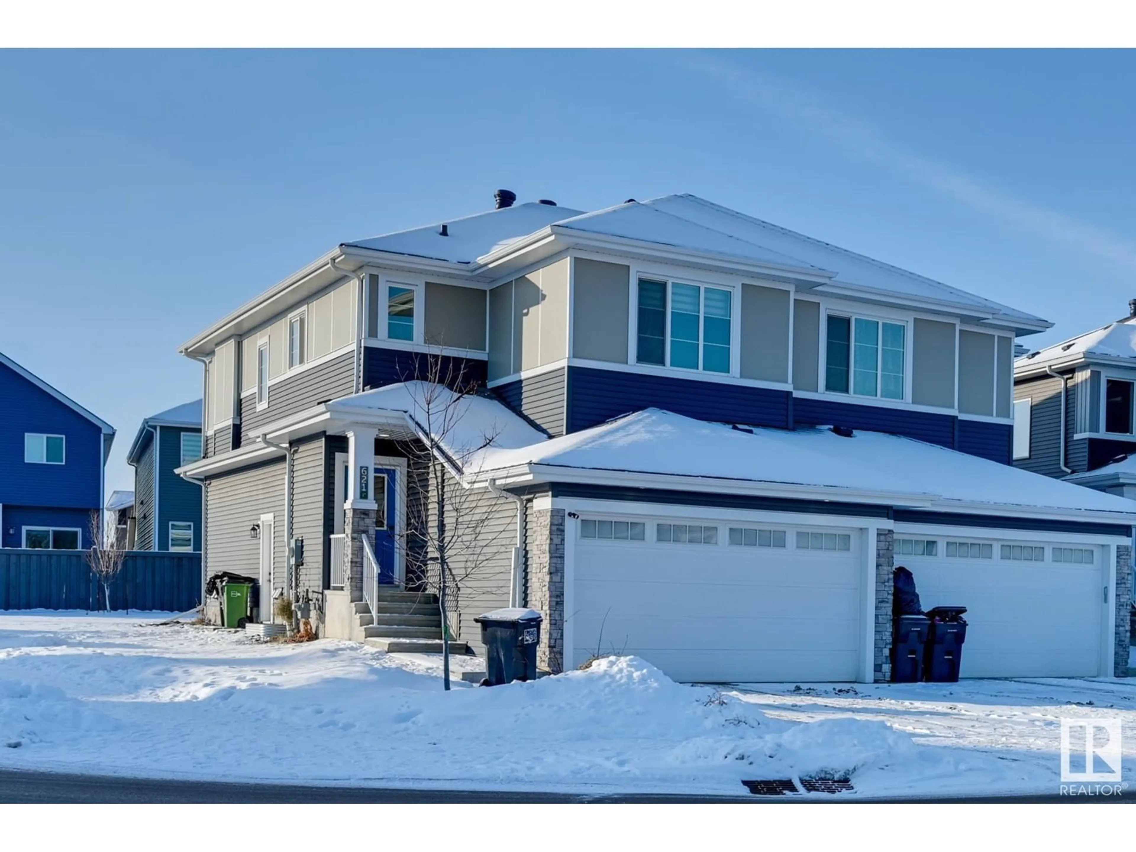 Home with vinyl exterior material, street for 621 GLENRIDDING RAVINE DR SW, Edmonton Alberta T6W4N9