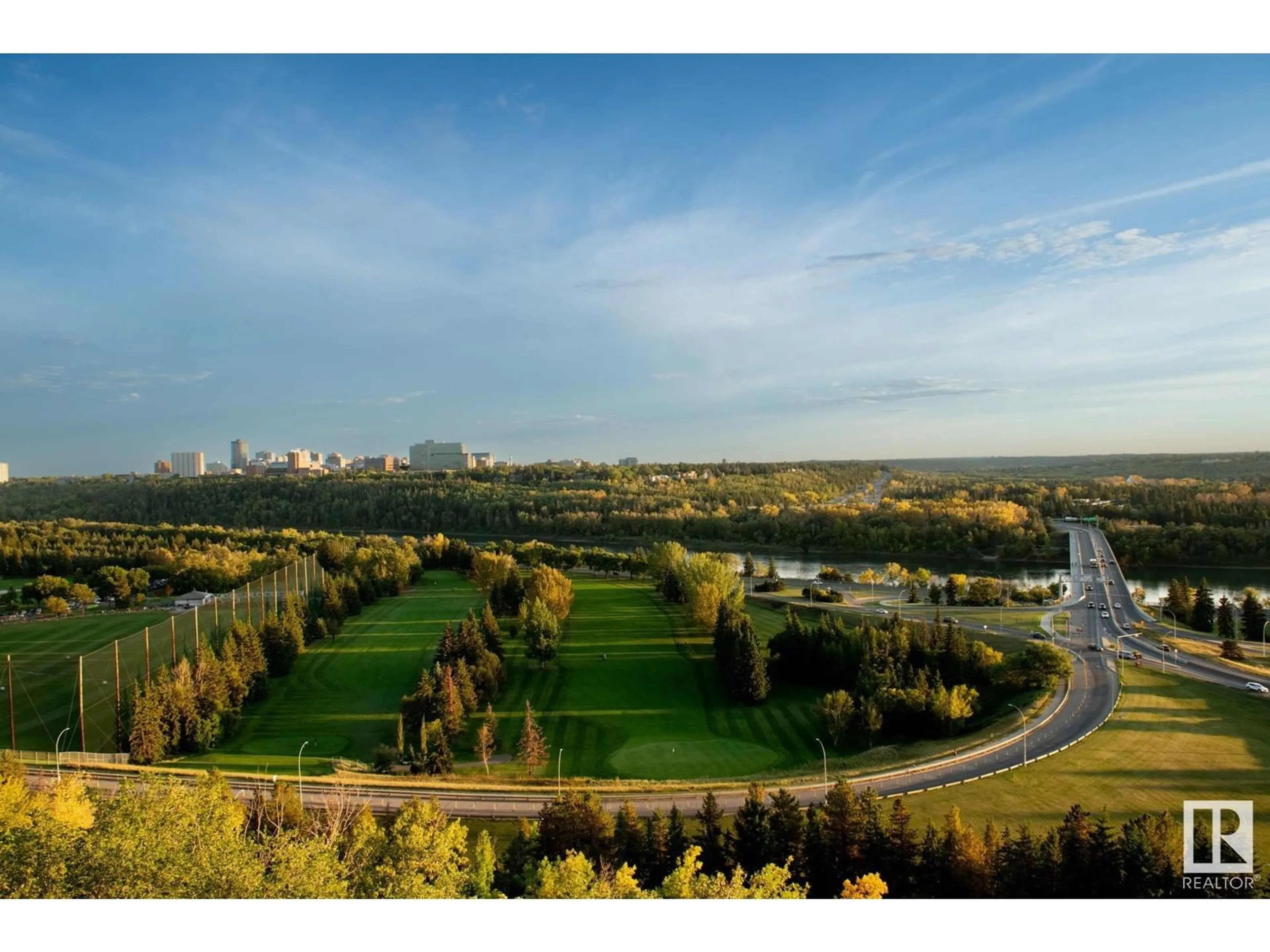 A pic from outside/outdoor area/front of a property/back of a property/a pic from drone, forest/trees view for #703 12319 Jasper AV NW, Edmonton Alberta T5N4A7