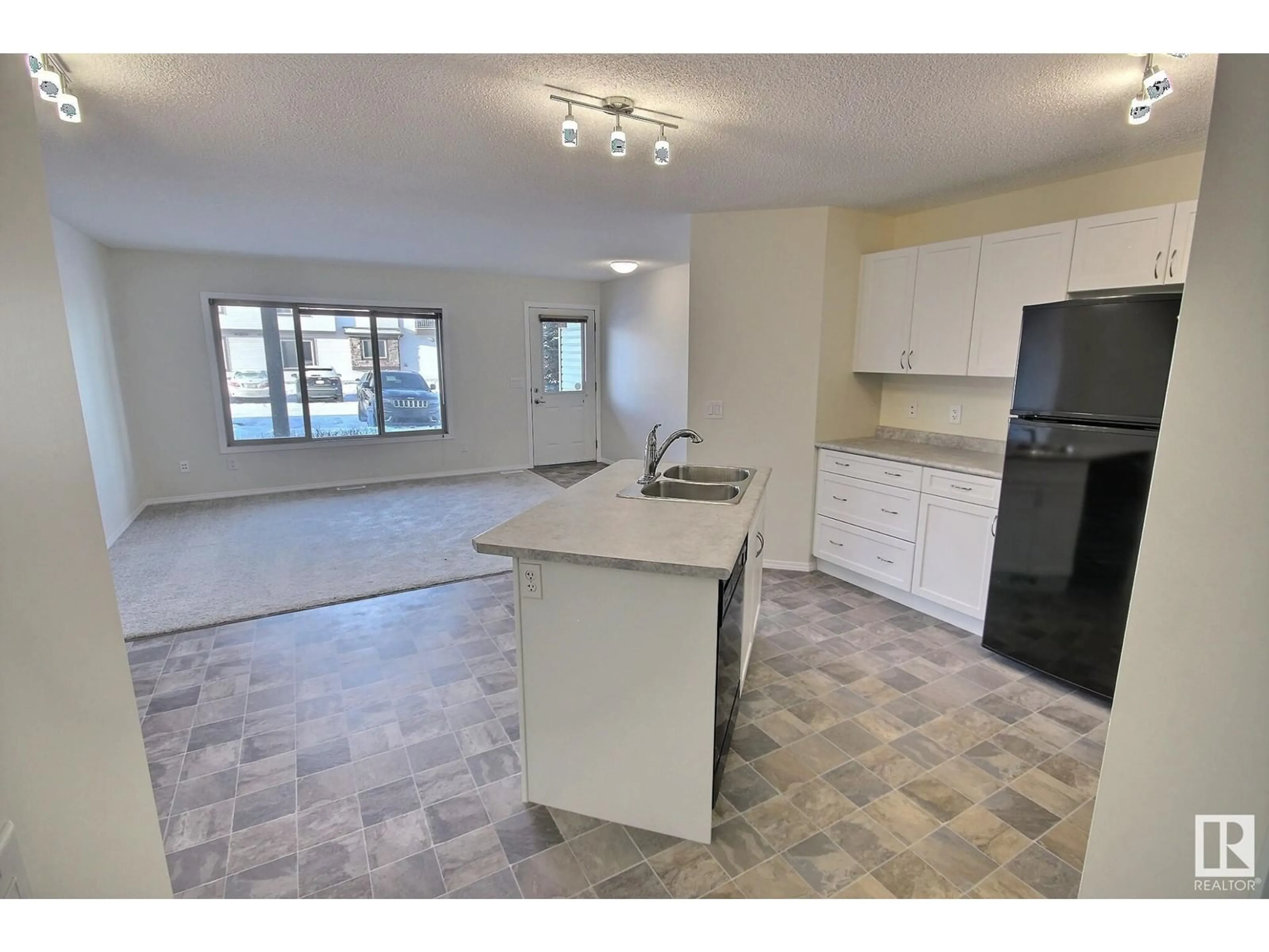 Open concept kitchen, unknown for #29 604 62 ST SW, Edmonton Alberta T6K0K4