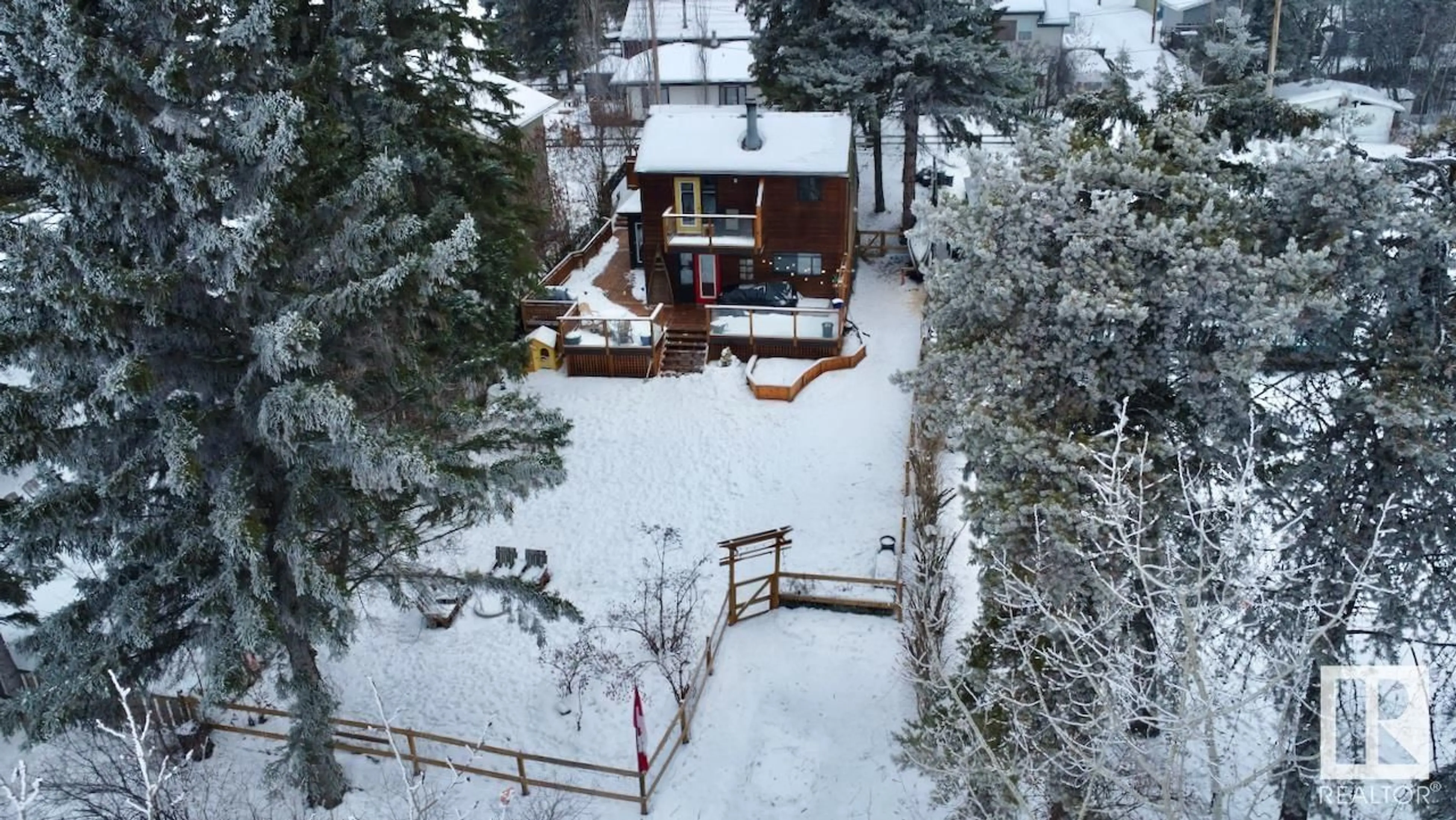 A pic from outside/outdoor area/front of a property/back of a property/a pic from drone, unknown for 920 1st AV S, Rural Parkland County Alberta T0E2B0