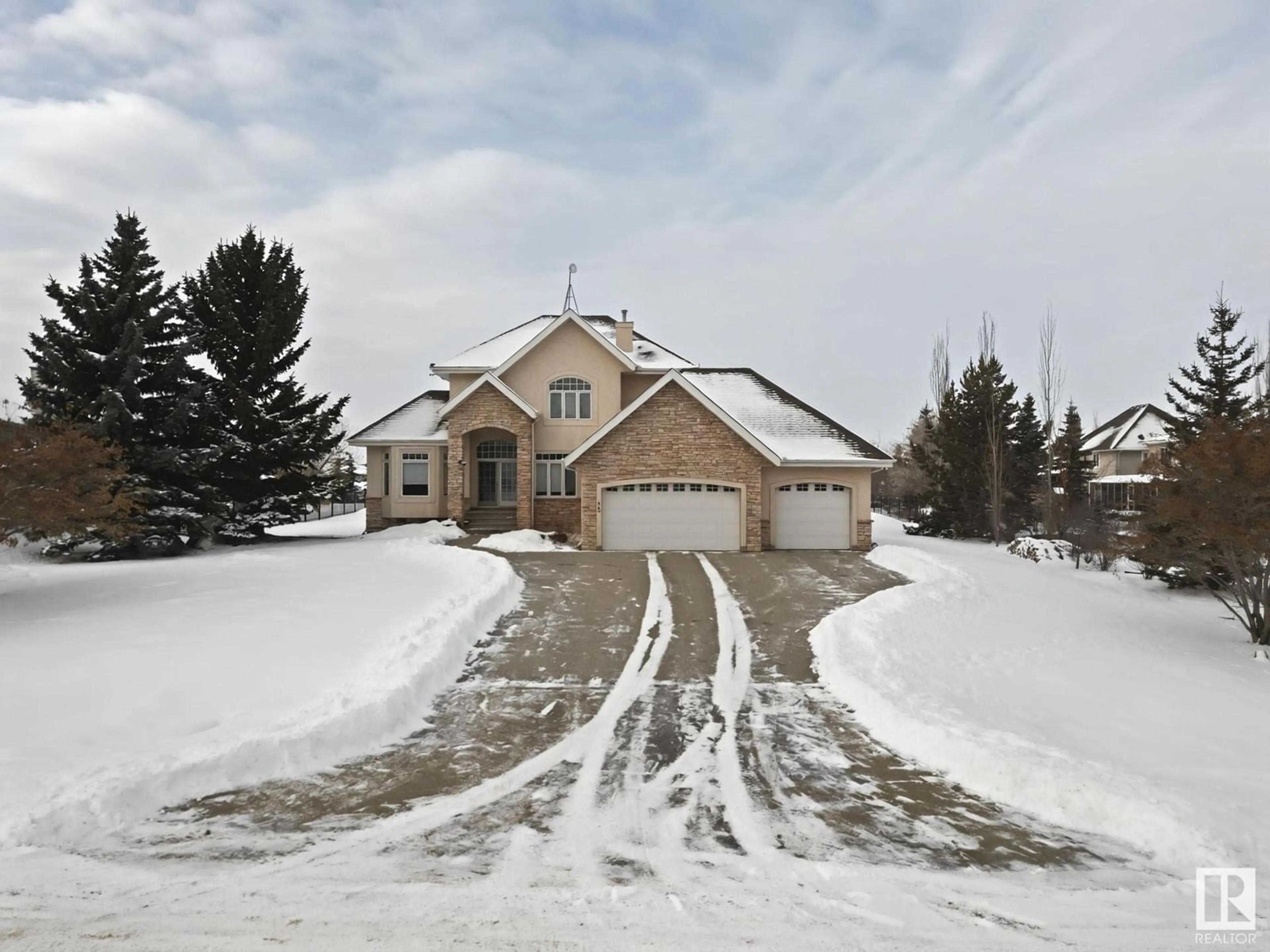 A pic from outside/outdoor area/front of a property/back of a property/a pic from drone, street for #12 26126 HGHWAY 16, Rural Parkland County Alberta T7Y1A1