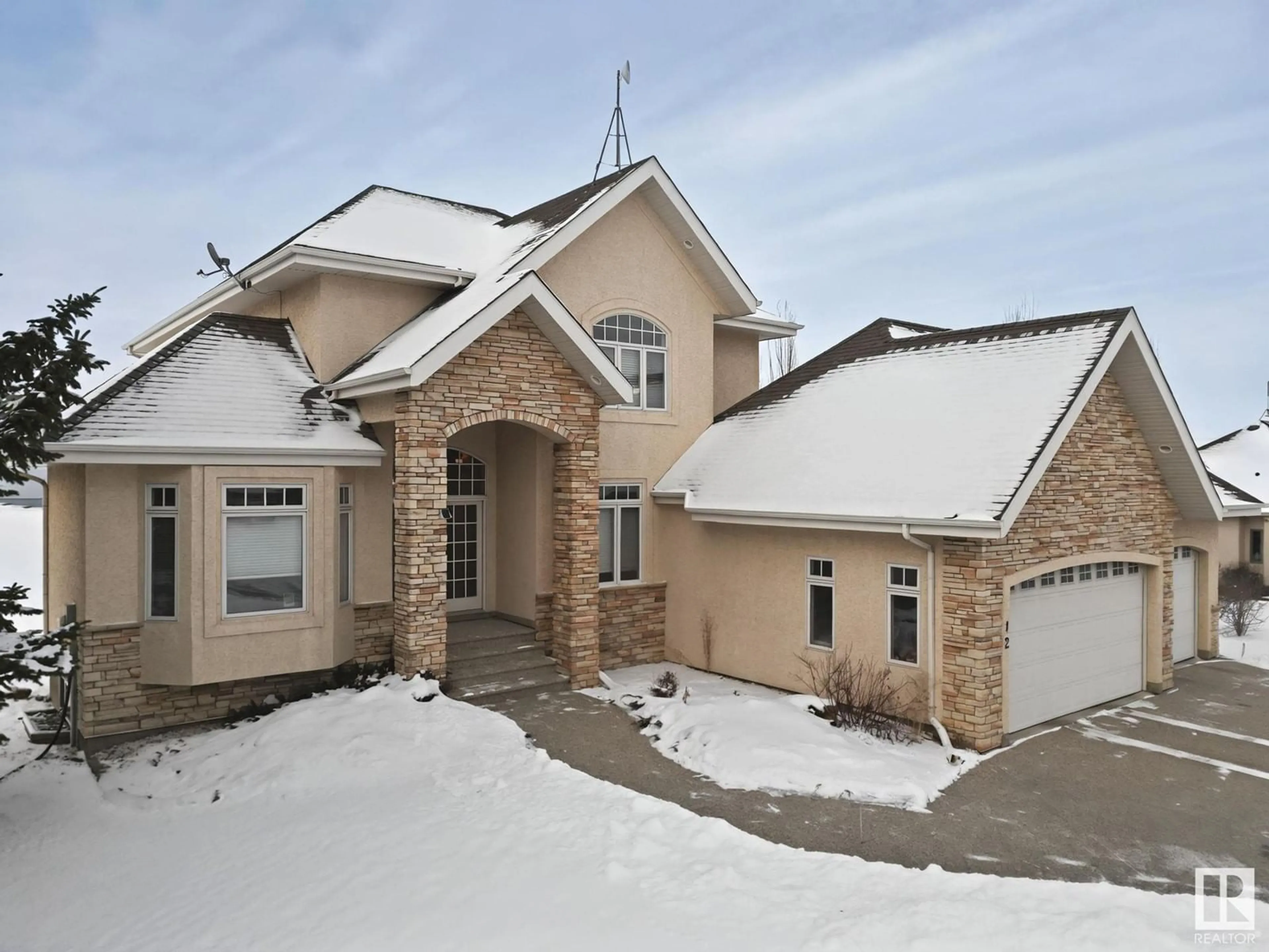 Home with brick exterior material, street for #12 26126 HGHWAY 16, Rural Parkland County Alberta T7Y1A1