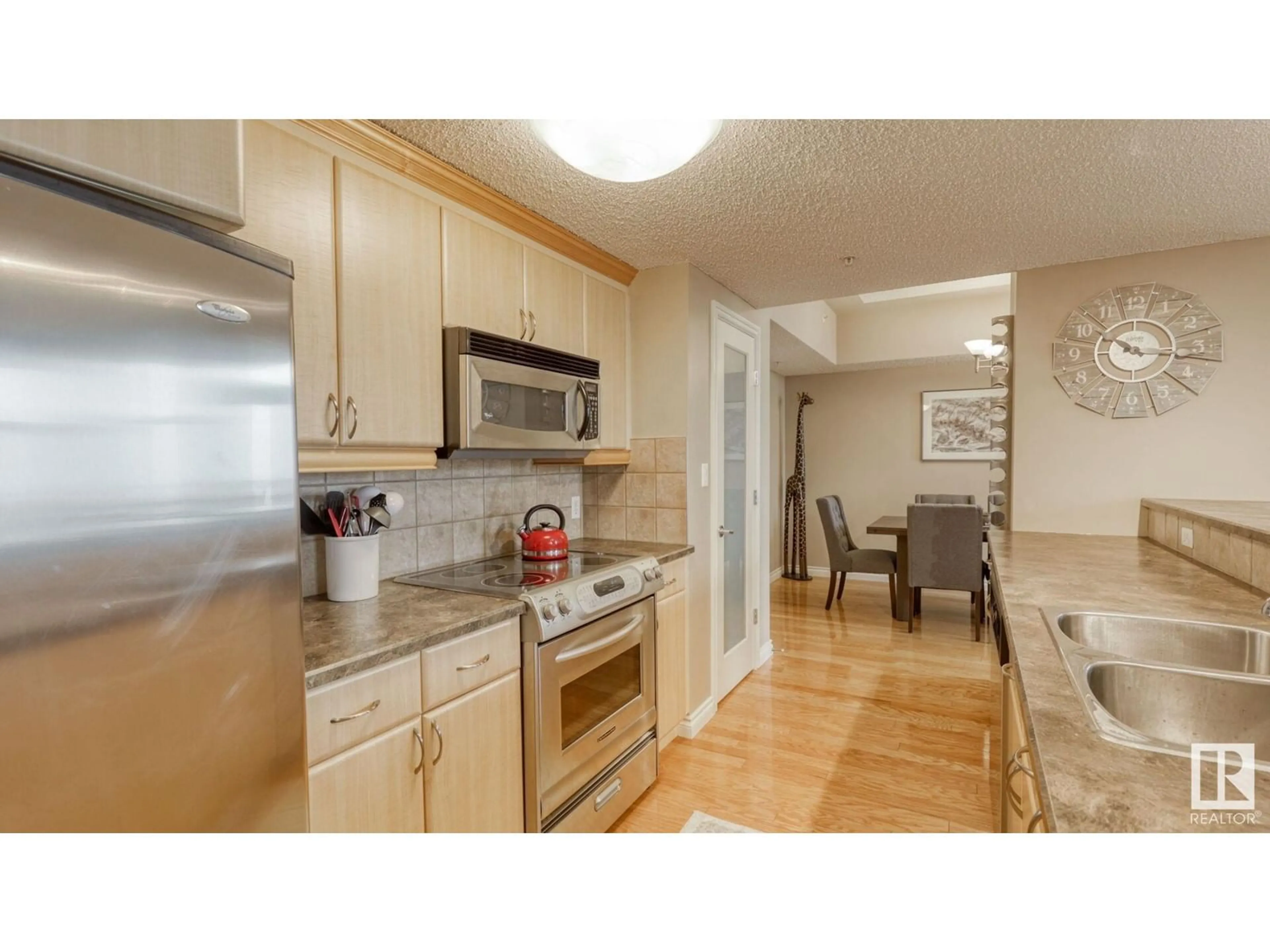 Standard kitchen, wood/laminate floor for #1401 9020 JASPER AV NW, Edmonton Alberta T5H3S8