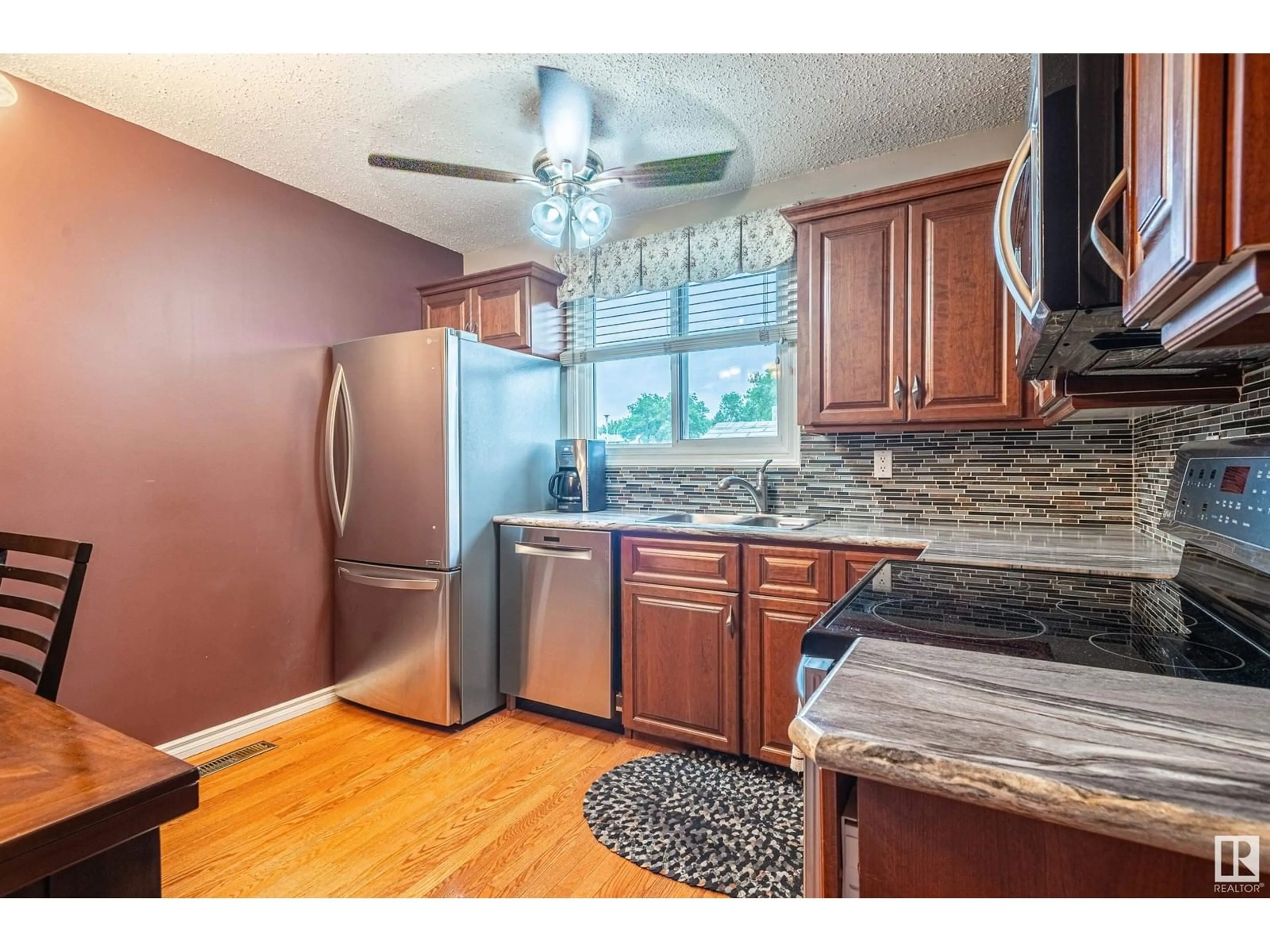 Standard kitchen, wood/laminate floor for 3131 144 AV NW, Edmonton Alberta T5Y1H4