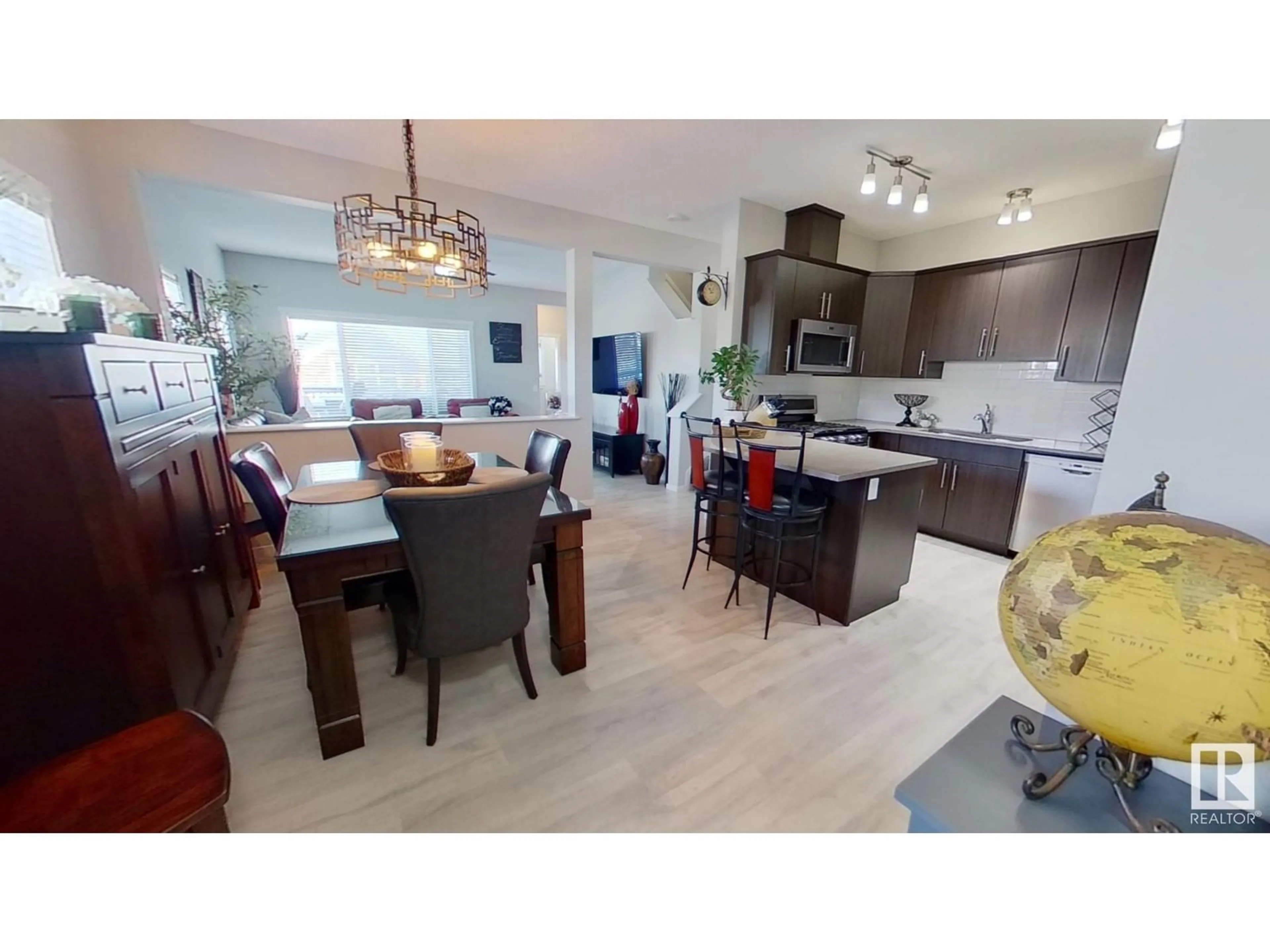 Open concept kitchen, wood/laminate floor for 3 AVEBURY CT, Sherwood Park Alberta T8H0Z2