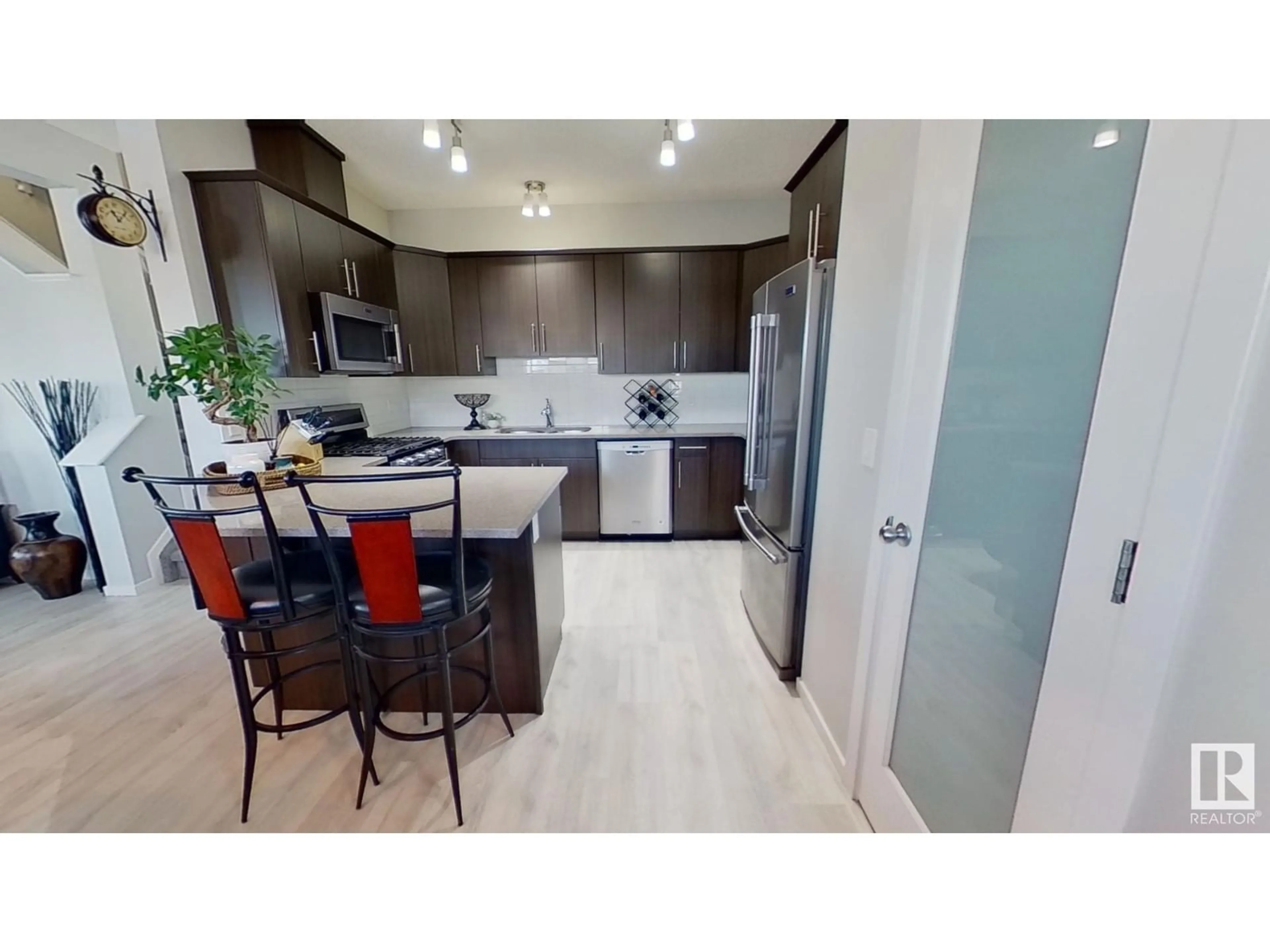 Open concept kitchen, unknown for 3 AVEBURY CT, Sherwood Park Alberta T8H0Z2