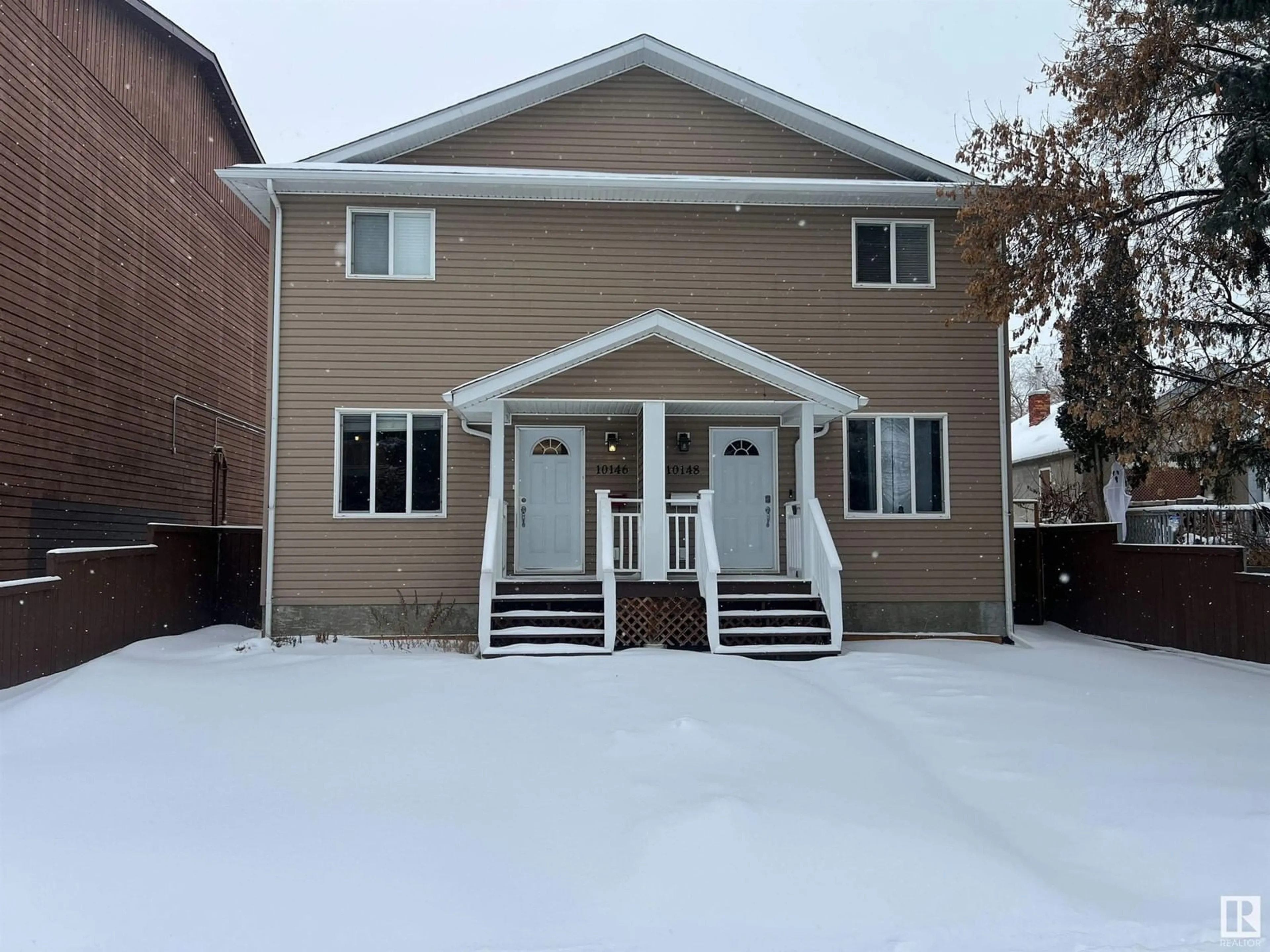 Home with vinyl exterior material, street for 10146 159 ST NW, Edmonton Alberta T5P2Z9