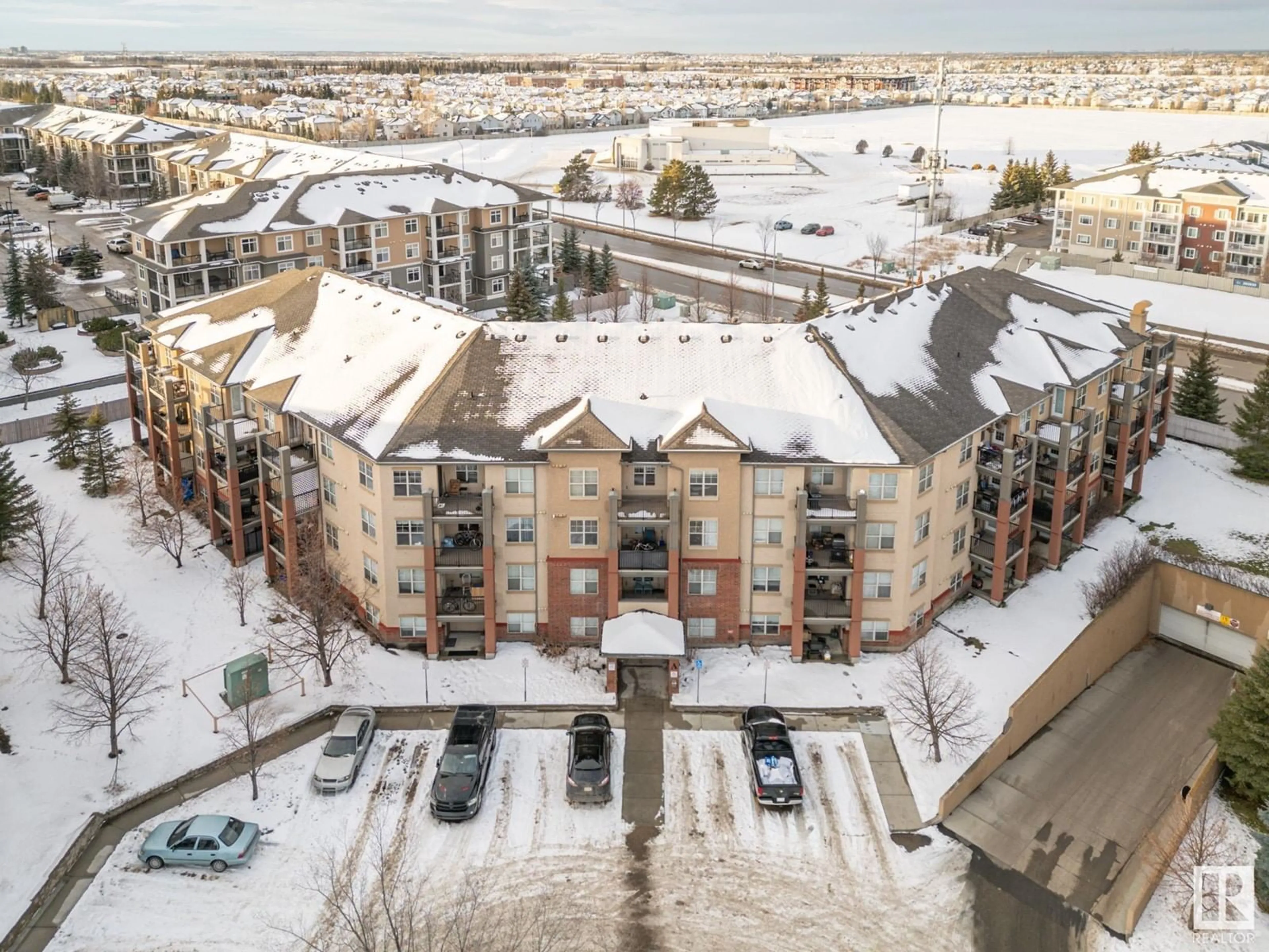 A pic from outside/outdoor area/front of a property/back of a property/a pic from drone, city buildings view from balcony for #A313 11445 Ellerslie Road SW SW, Edmonton Alberta T6W1T1