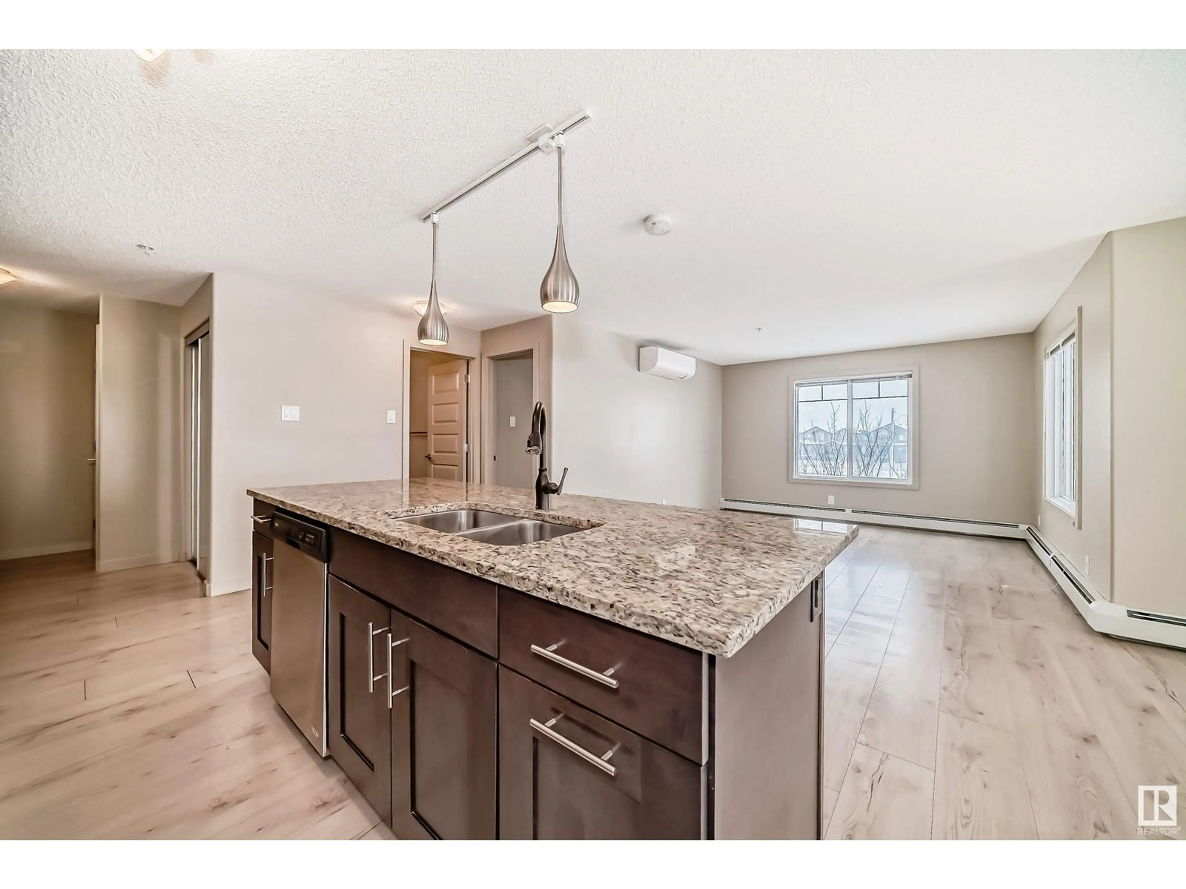 Open concept kitchen, unknown for #302 4008 SAVARYN DR SW, Edmonton Alberta T6X2E5