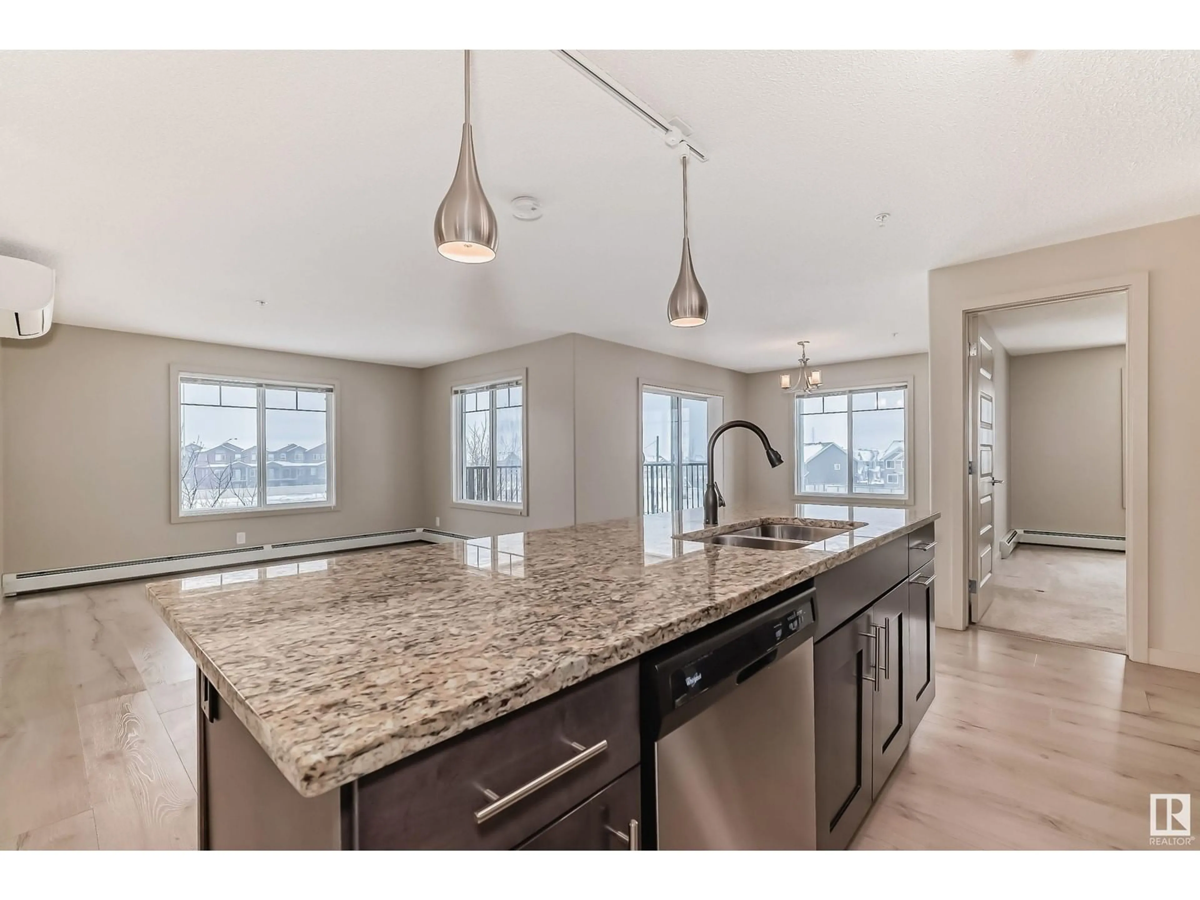 Open concept kitchen, unknown for #302 4008 SAVARYN DR SW, Edmonton Alberta T6X2E5