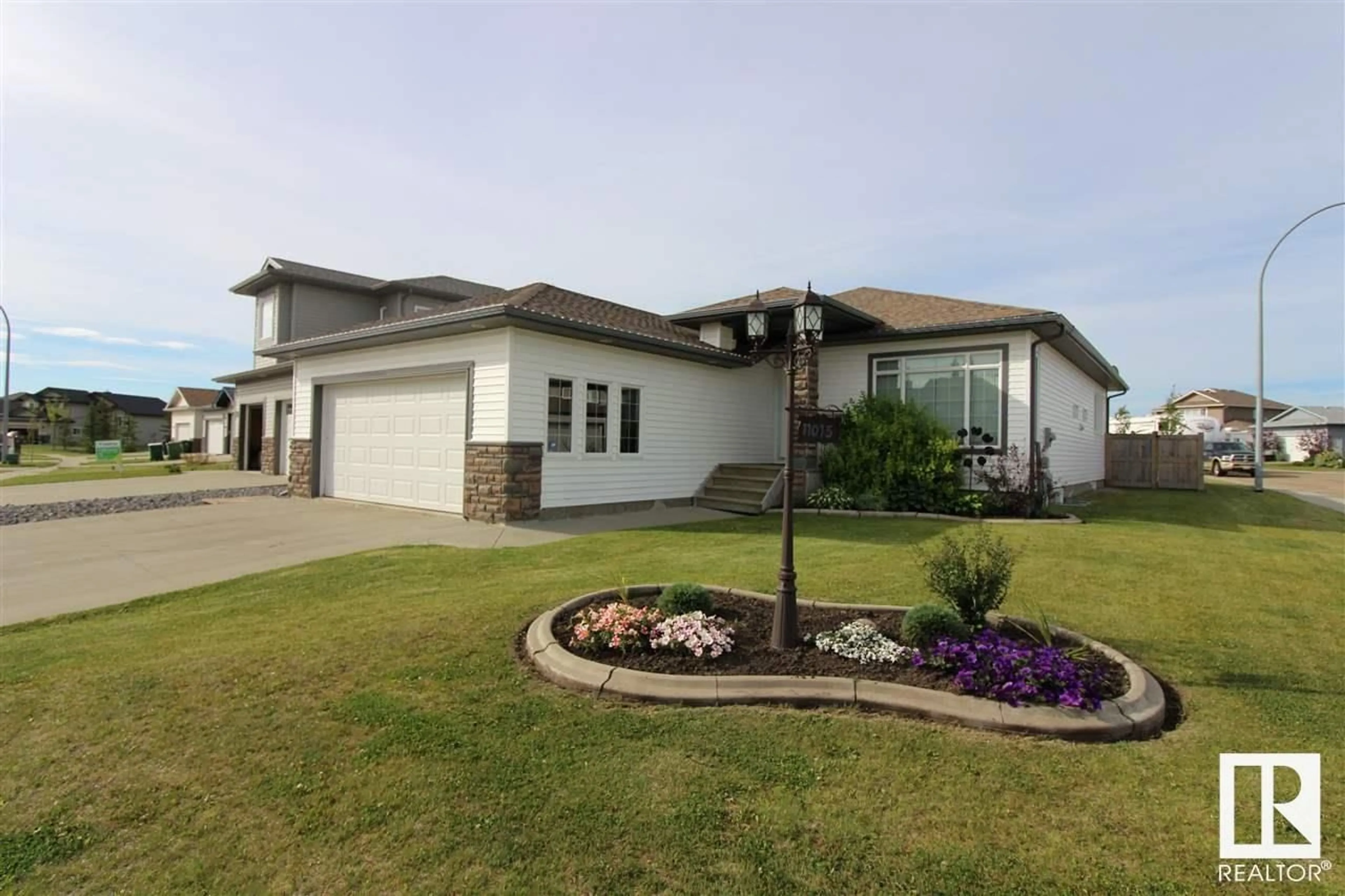 Home with vinyl exterior material, street for 11015 103 ST, Westlock Alberta T7P1G6