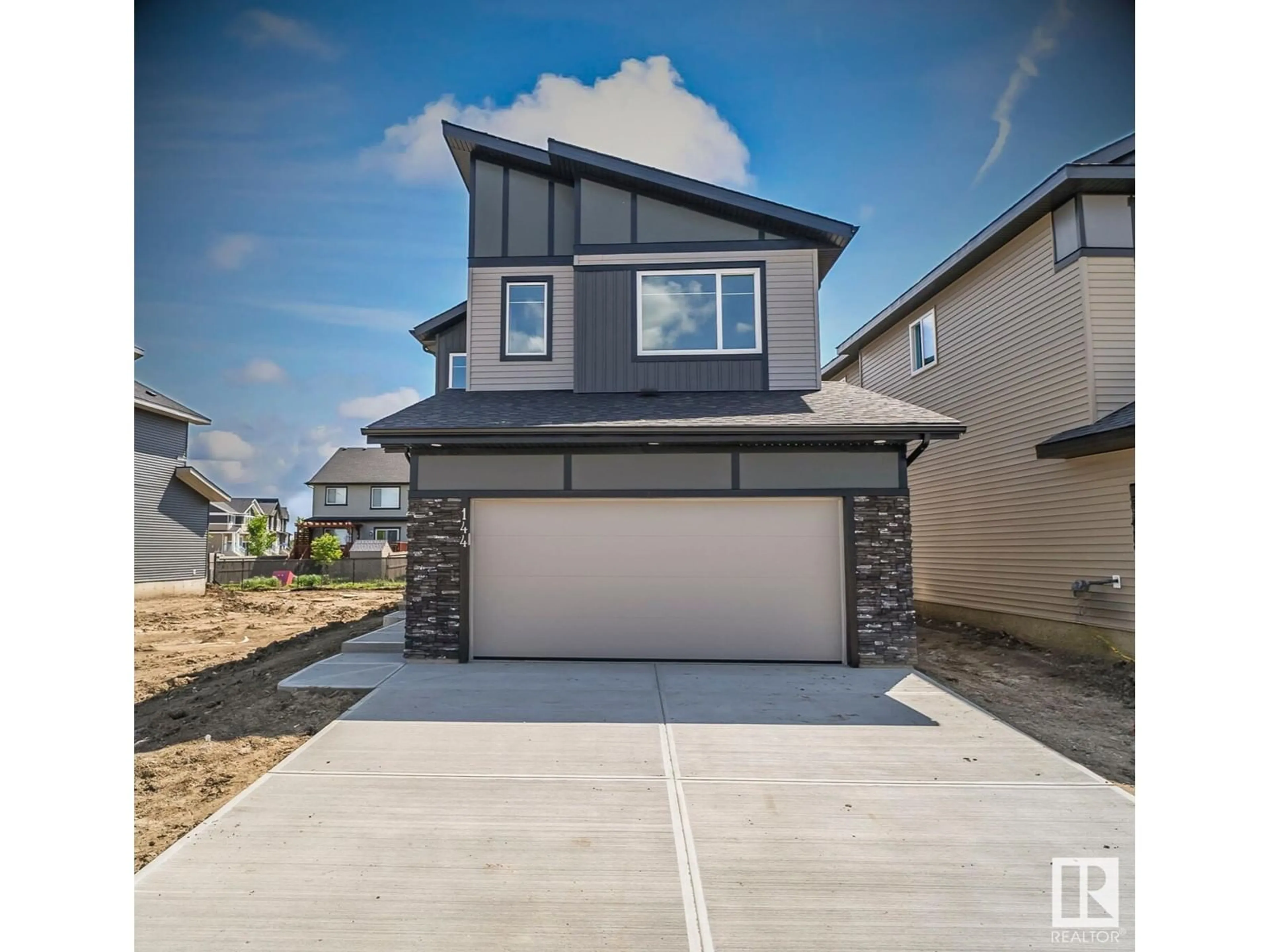 Home with vinyl exterior material, street for 144 Larch Crescent, Leduc Alberta T9E1N3