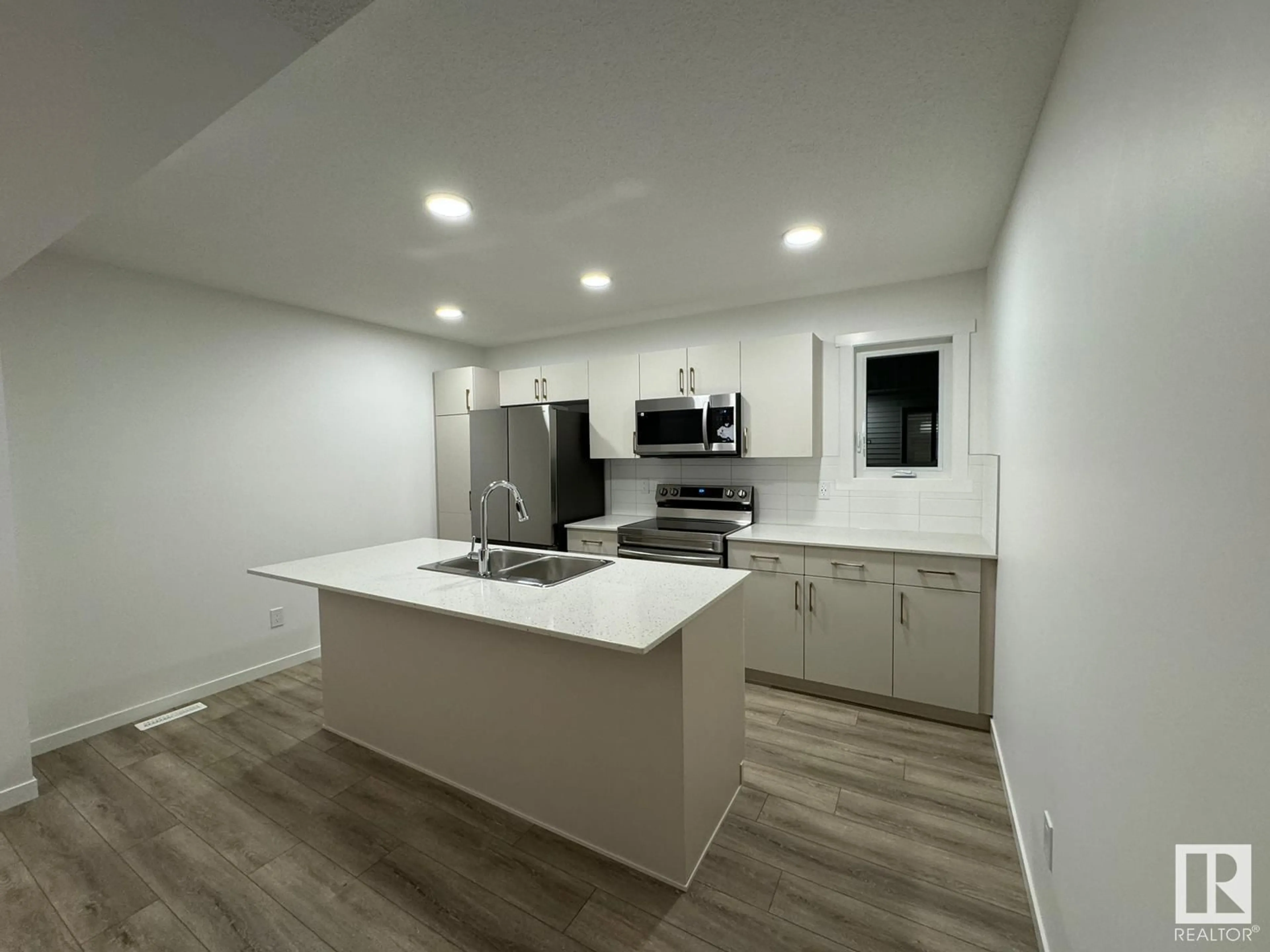 Open concept kitchen, unknown for #115 1025 SECORD PROMENADE NW NW, Edmonton Alberta T5V7T4