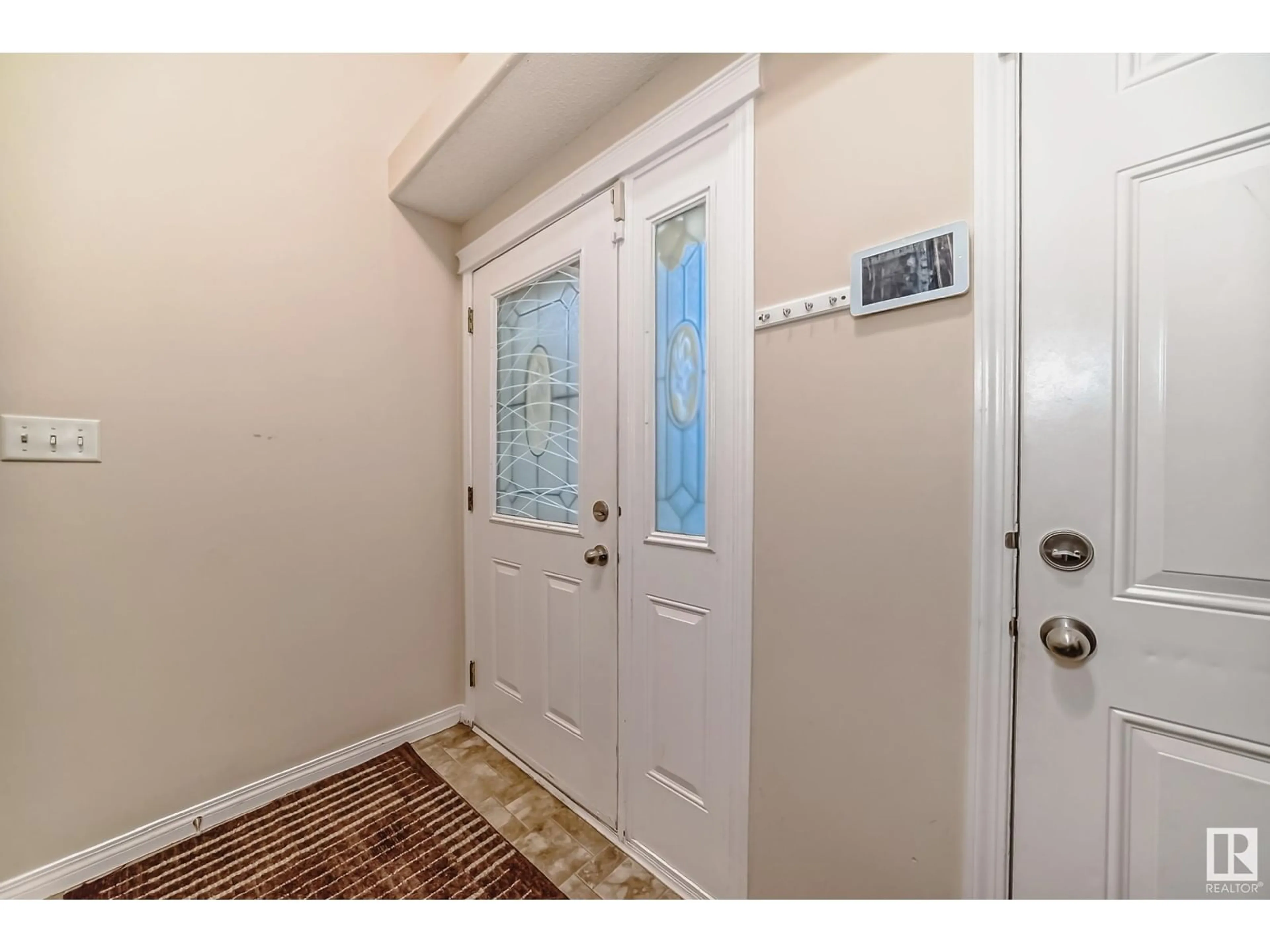 Indoor entryway for 11216 167B AV NW, Edmonton Alberta T5X6J6