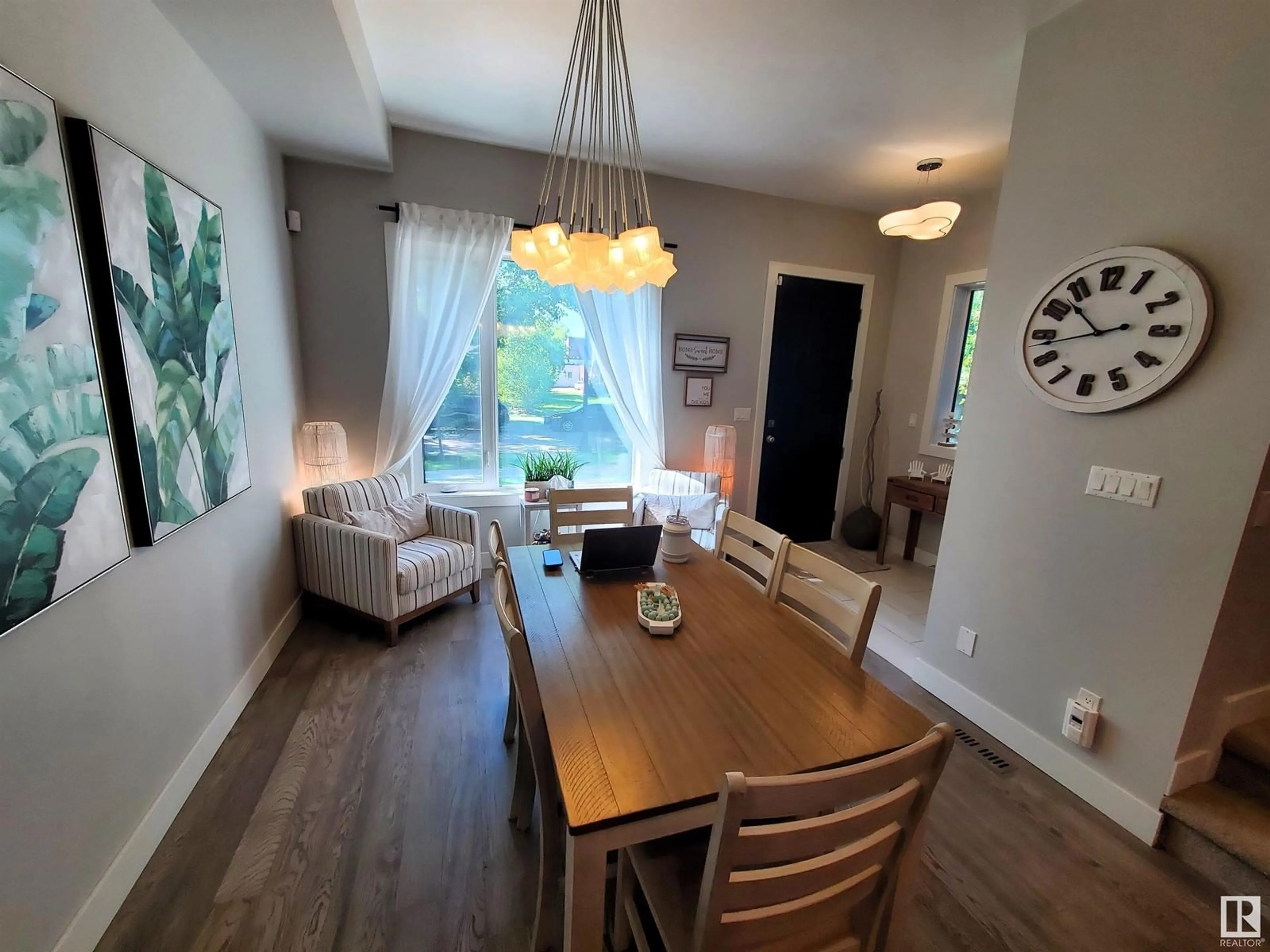 Dining room, wood/laminate floor for 14032 106 AV NW, Edmonton Alberta T5N1B2