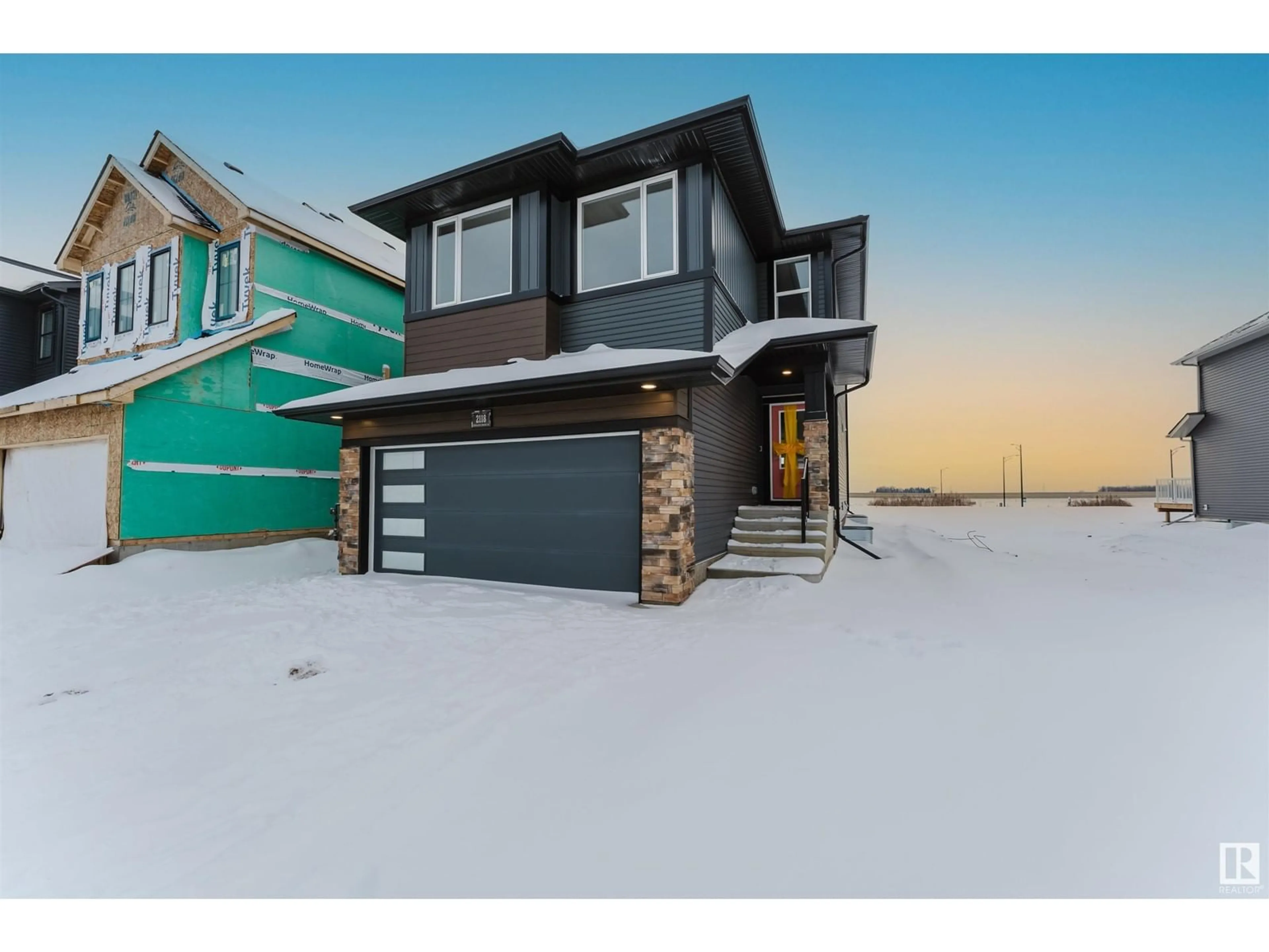 Home with vinyl exterior material, street for 2118 MUCKLEPLUM CRESCENT SW SW, Edmonton Alberta T6X3H1