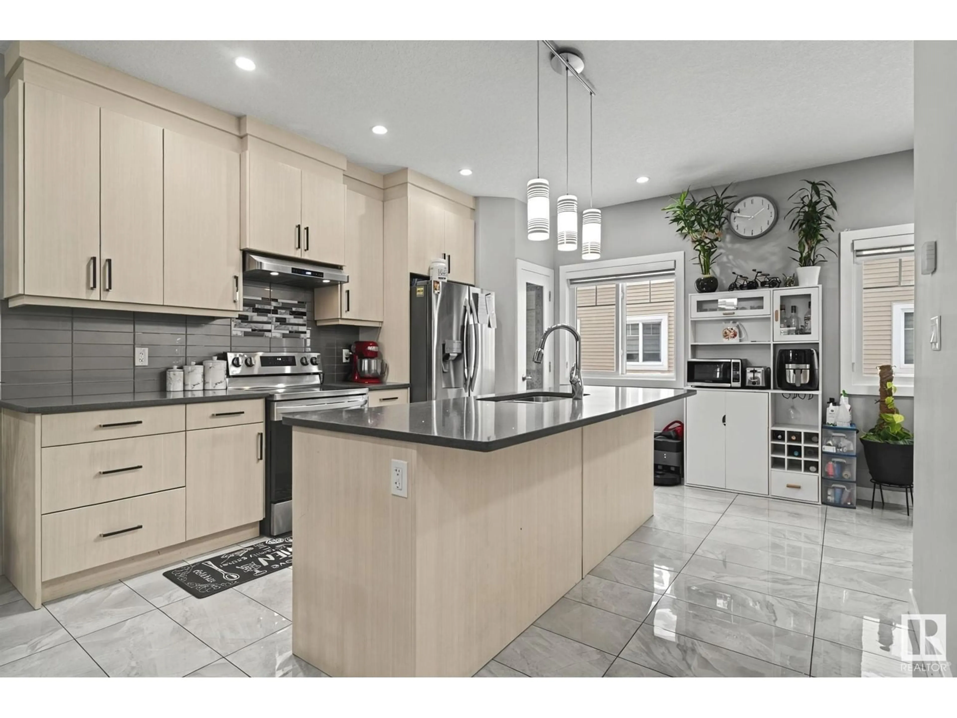 Open concept kitchen, ceramic/tile floor for #36 2803 14 AV NW, Edmonton Alberta T6T2K4