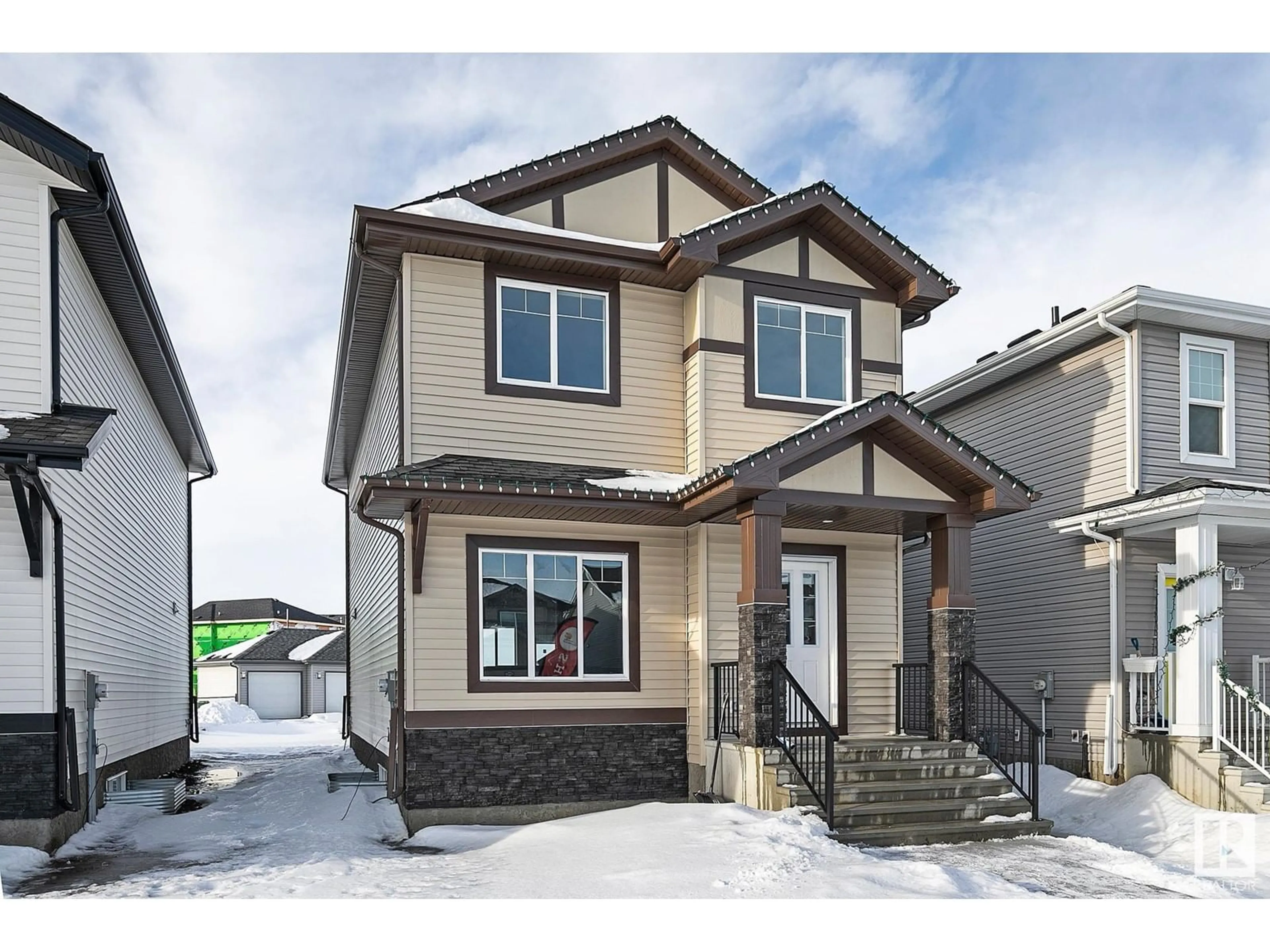 Home with vinyl exterior material, street for 9823 107A AVENUE, Morinville Alberta T8R2P1