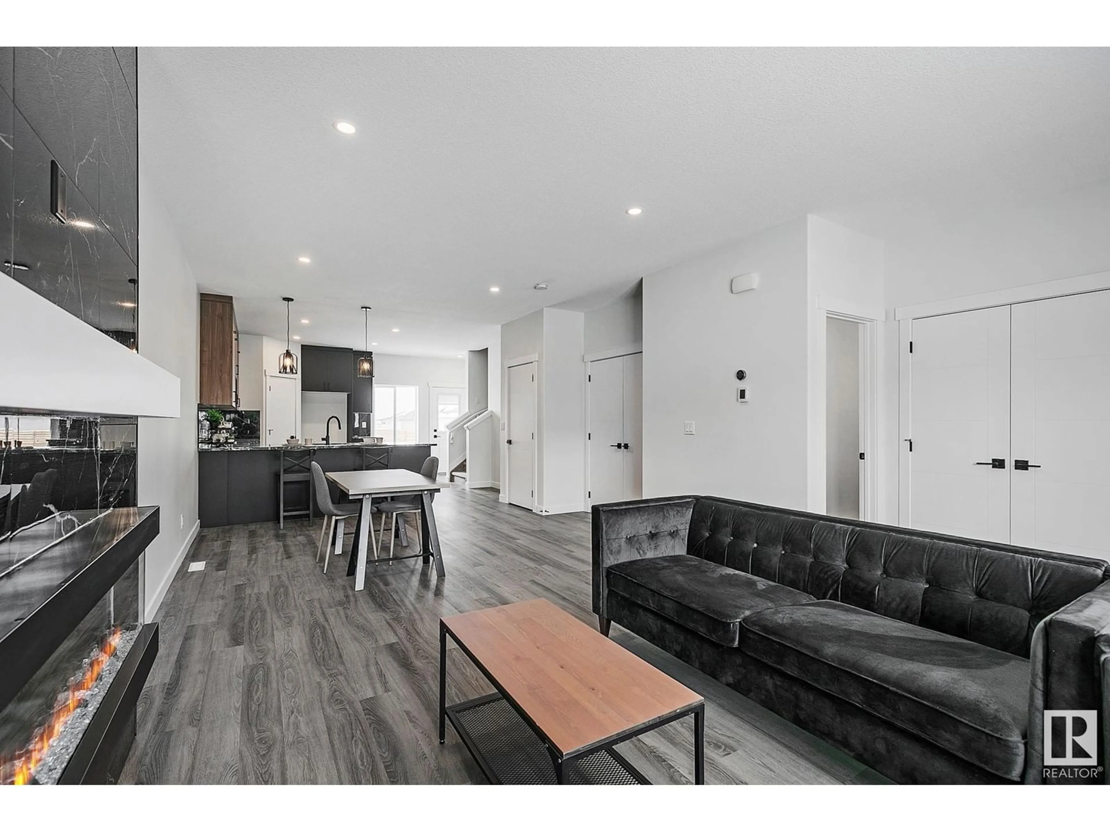 Open concept kitchen, wood/laminate floor for 9823 107A AVENUE, Morinville Alberta T8R2P1