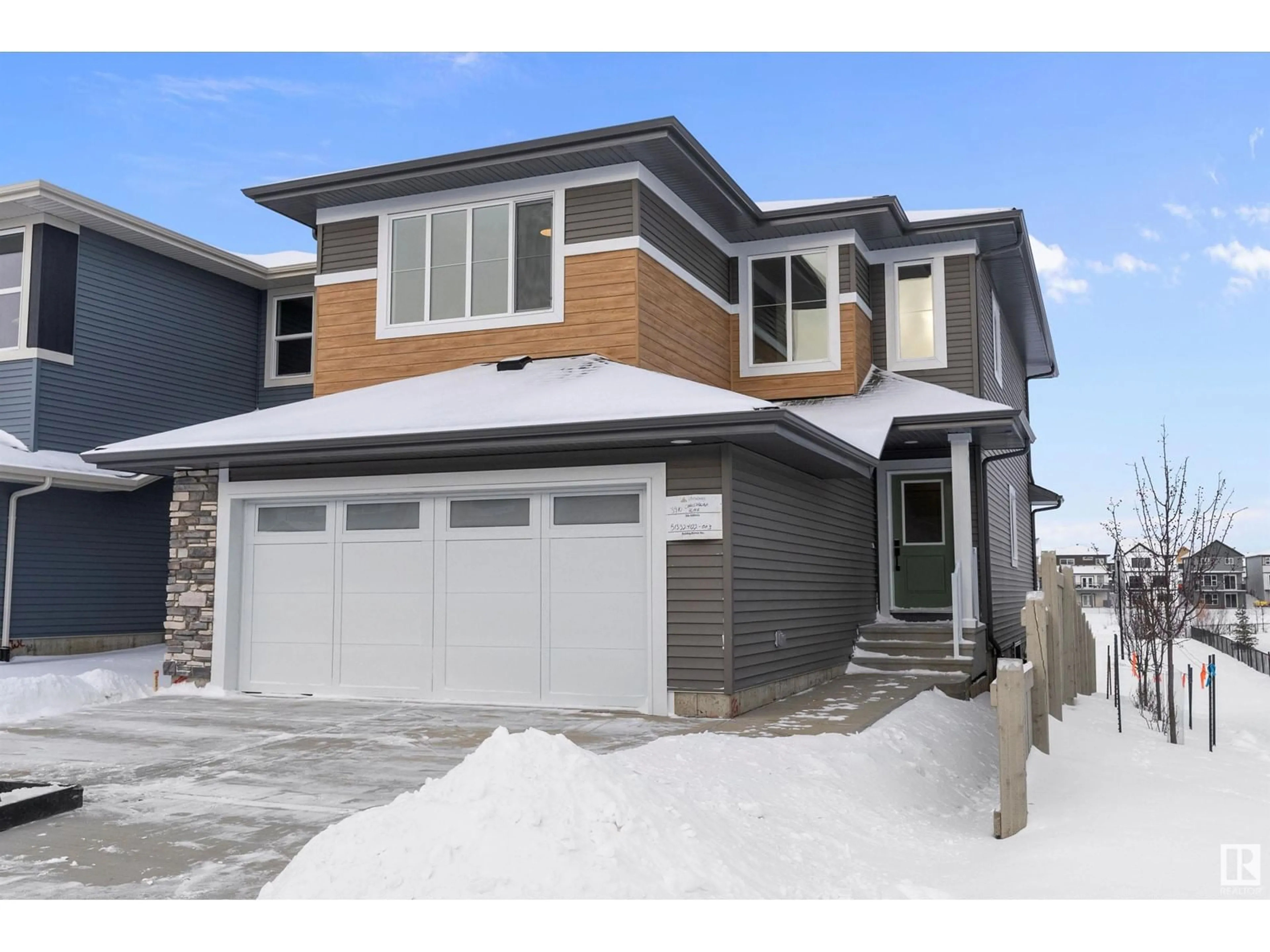 Home with vinyl exterior material, street for 3910 Chrustawka PL SW, Edmonton Alberta T6W5K6