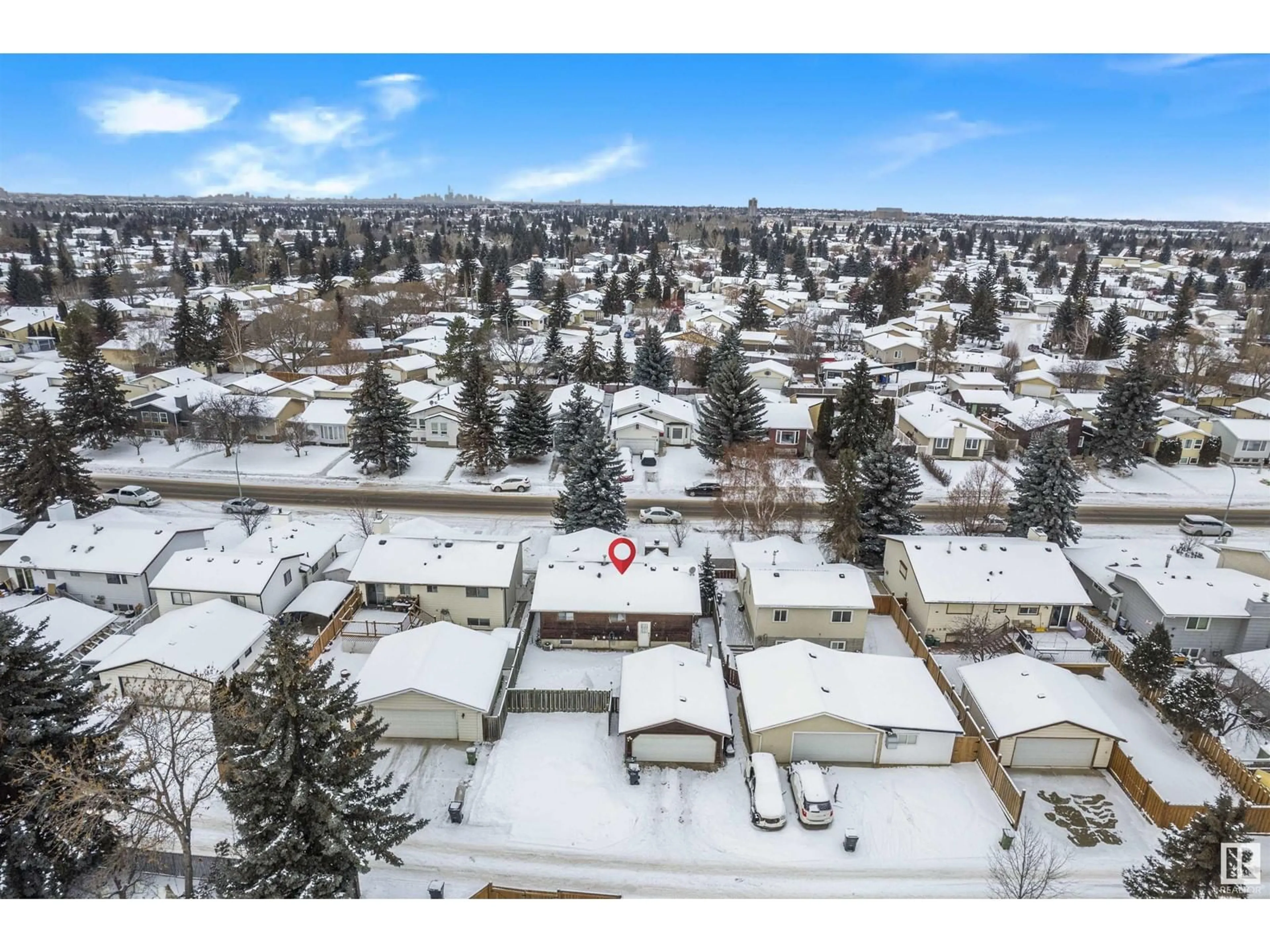 A pic from outside/outdoor area/front of a property/back of a property/a pic from drone, mountain view for 6327 12 AV NW, Edmonton Alberta T6L2G3