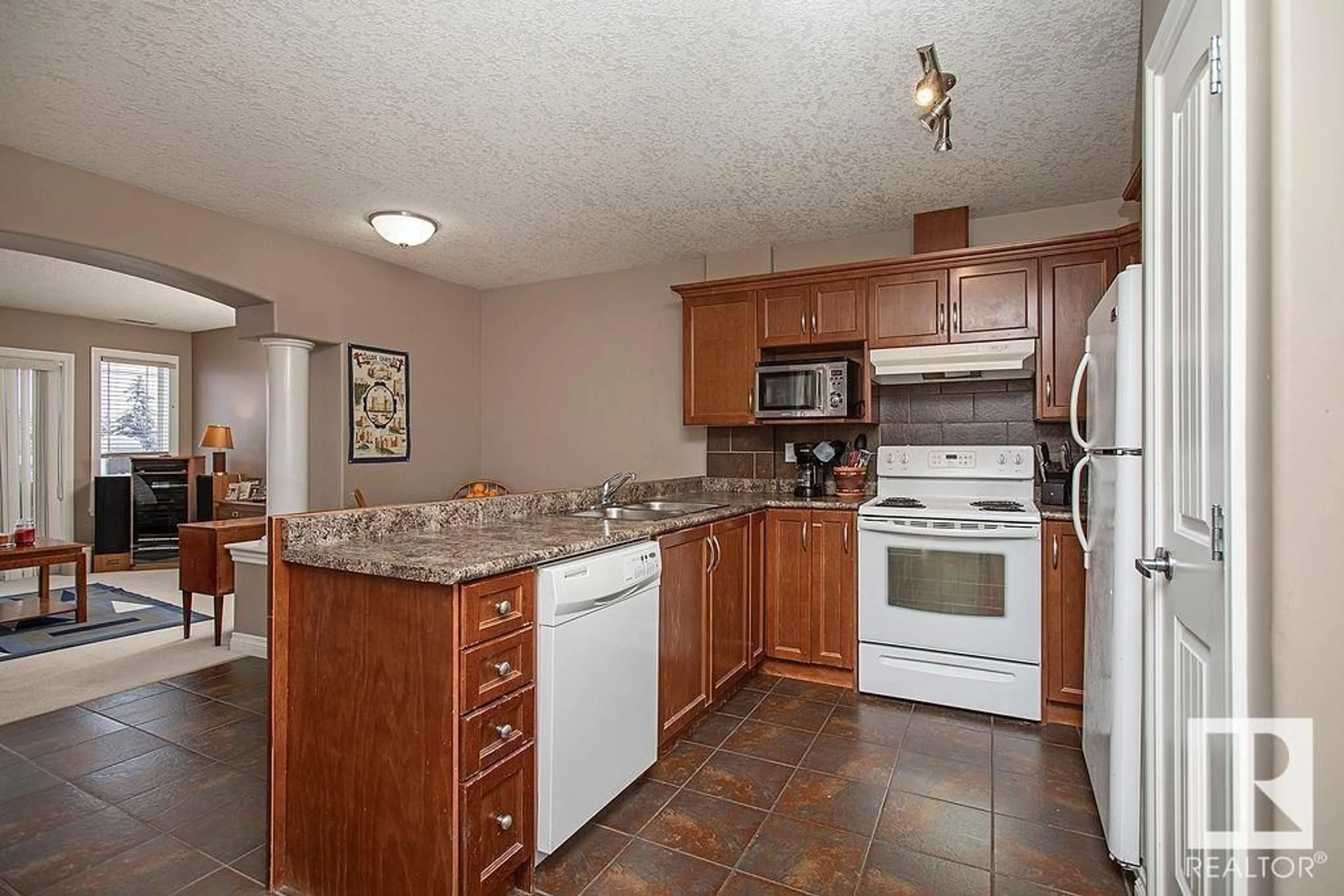 Standard kitchen, ceramic/tile floor for #304 5204 52 AV, Tofield Alberta T0B4J0