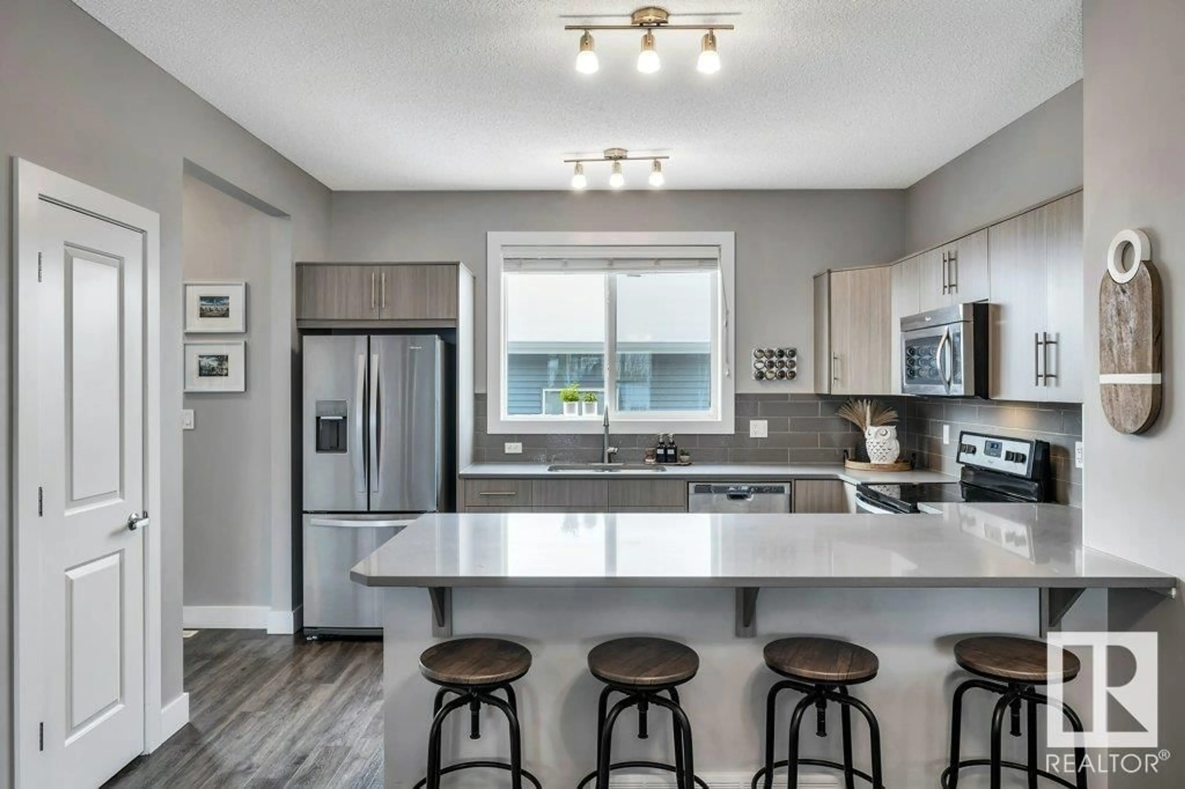 Open concept kitchen, unknown for 2114 24 ST NW, Edmonton Alberta T6T0Y8