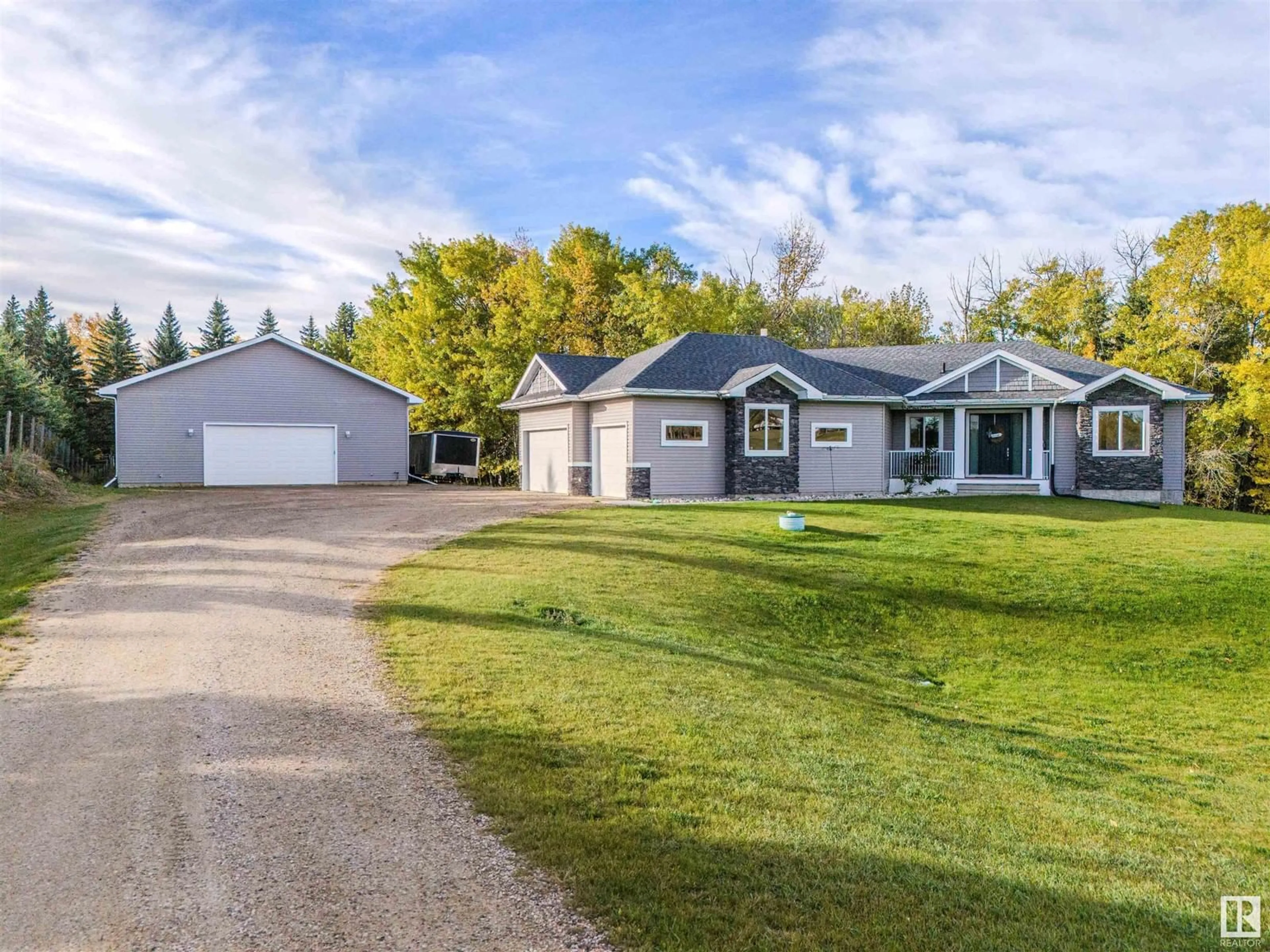 A pic from outside/outdoor area/front of a property/back of a property/a pic from drone, street for 53024 RGE RD 15, Rural Parkland County Alberta T7Y2T4