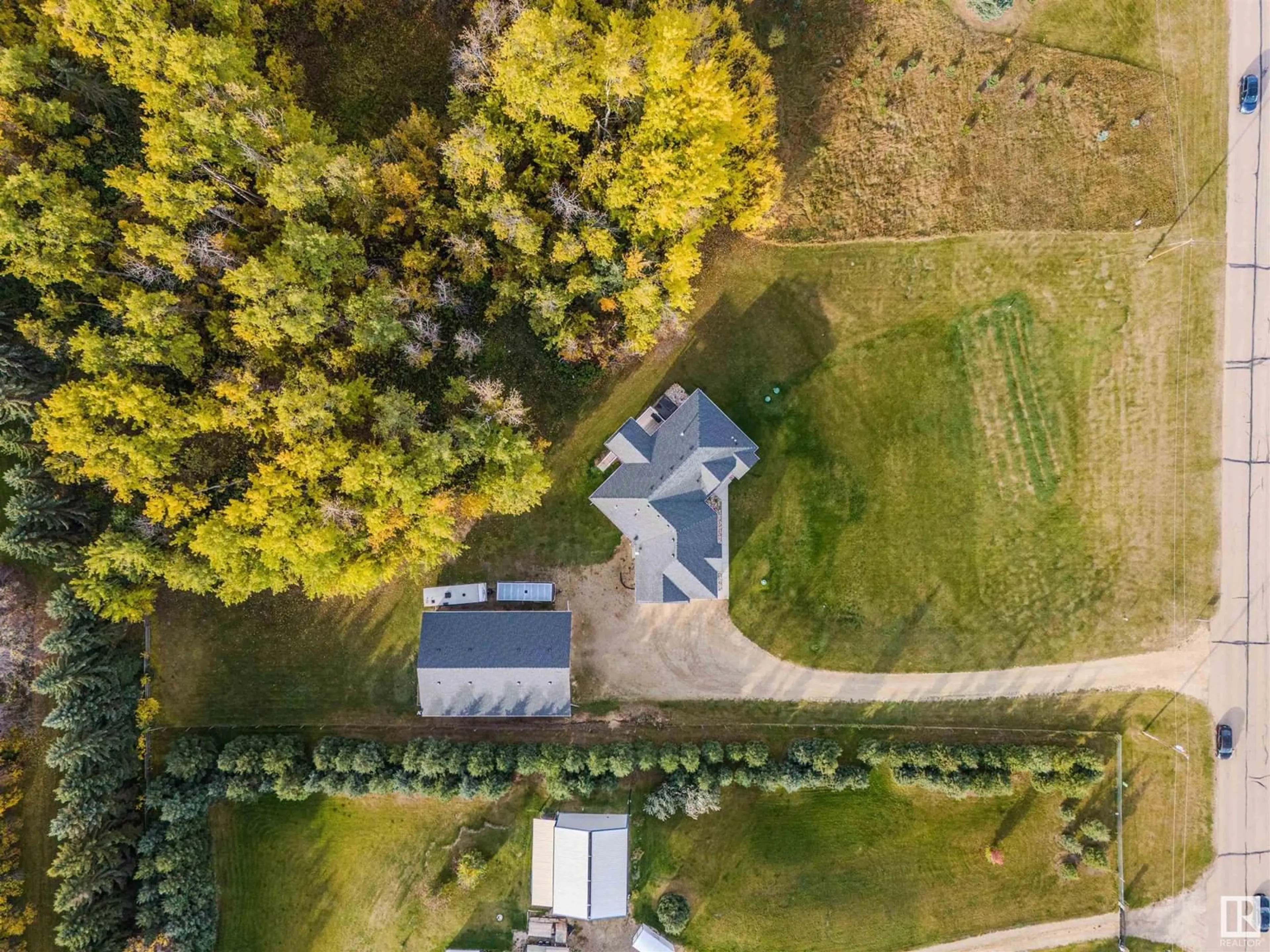 A pic from outside/outdoor area/front of a property/back of a property/a pic from drone, street for 53024 RGE RD 15, Rural Parkland County Alberta T7Y2T4