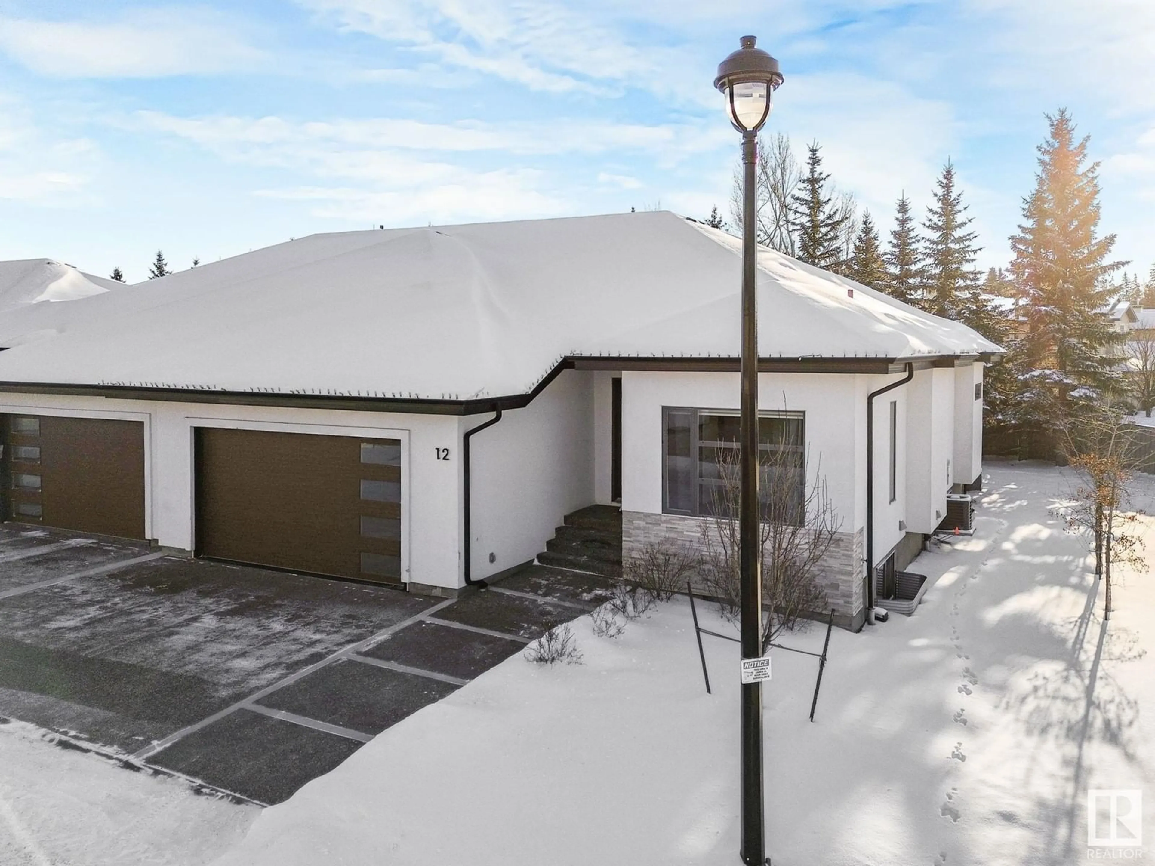 A pic from outside/outdoor area/front of a property/back of a property/a pic from drone, street for #12 604 MCALLISTER LO SW, Edmonton Alberta T6W1N1