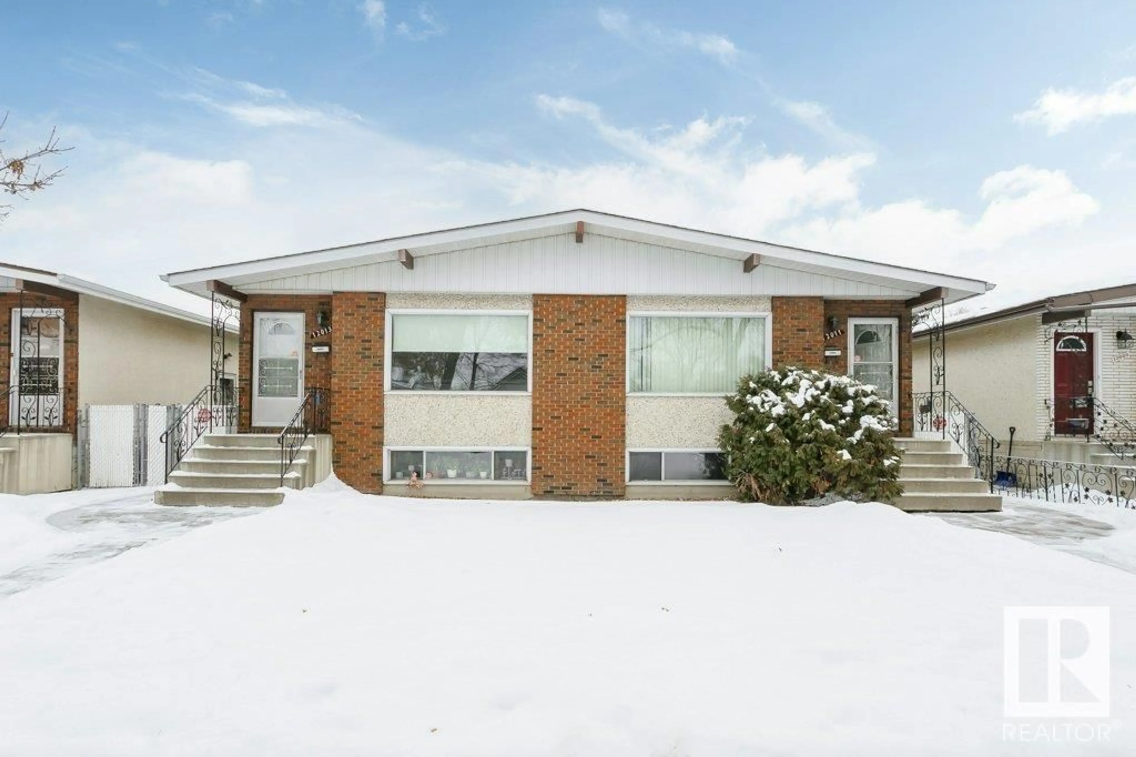 Home with brick exterior material, building for 12011 / 12013 85 ST NW NW, Edmonton Alberta T5B3G4