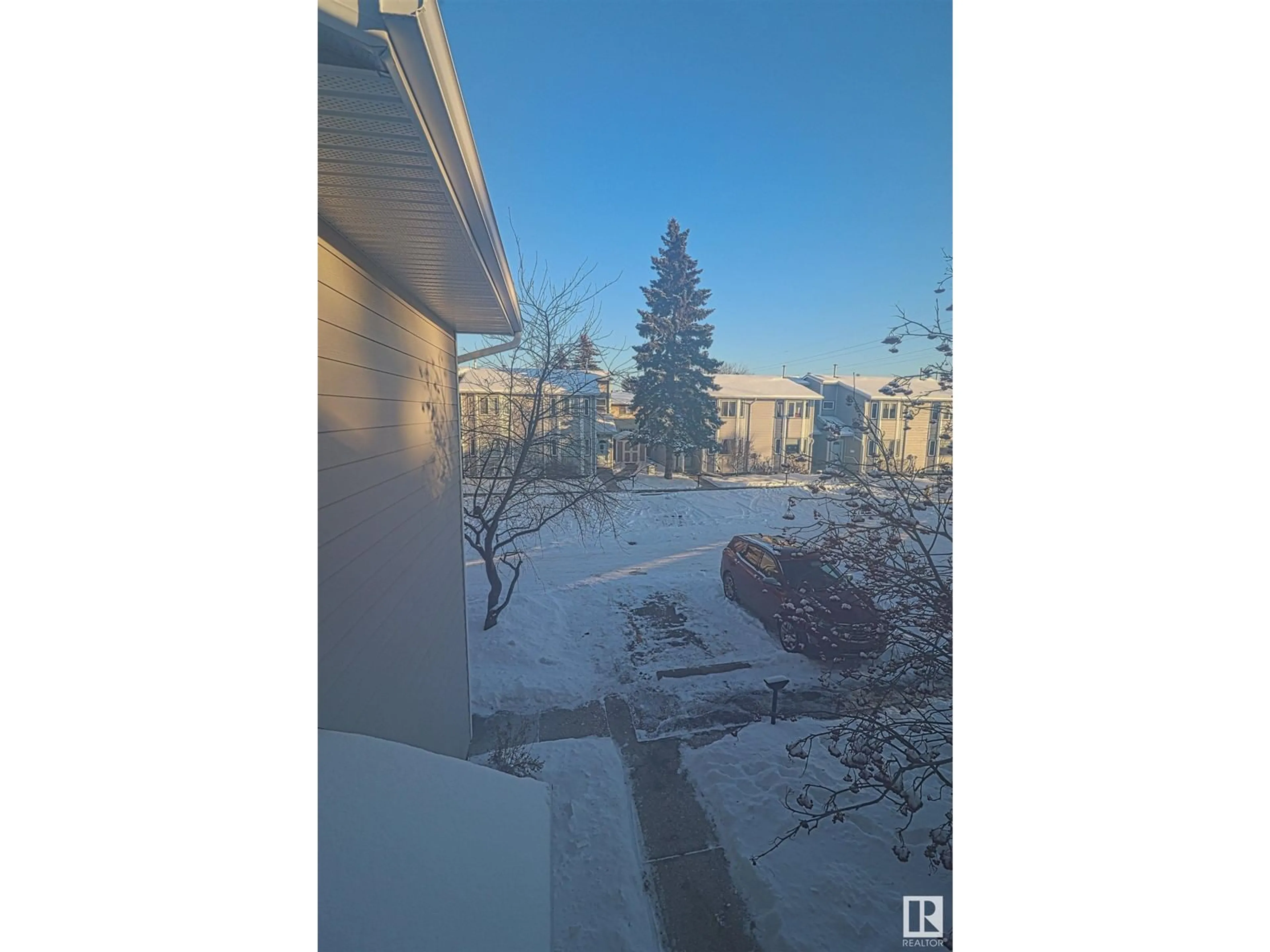 A pic from outside/outdoor area/front of a property/back of a property/a pic from drone, unknown for #121 10787 31 AV NW, Edmonton Alberta T6J4E7