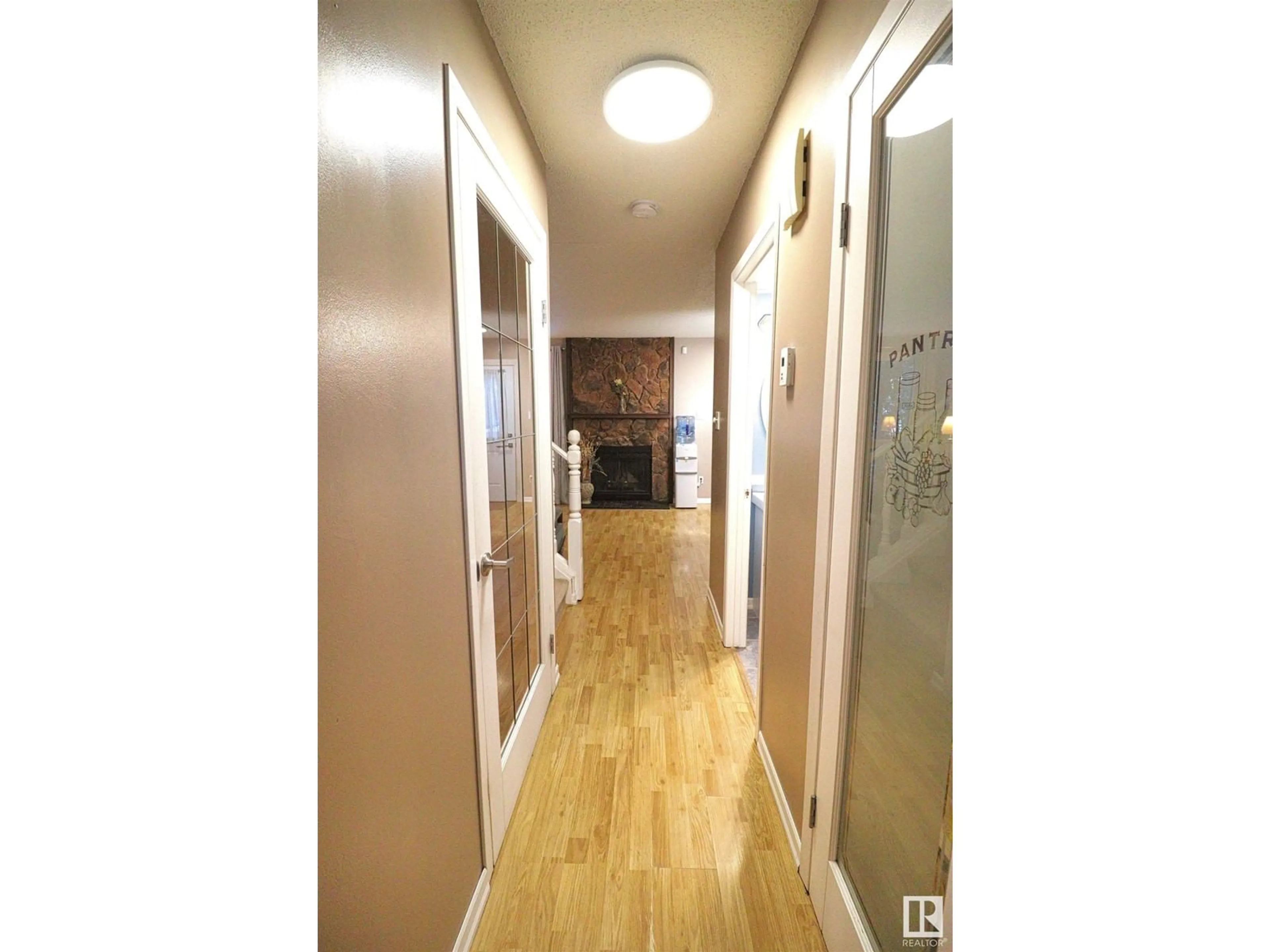 Indoor foyer for #121 10787 31 AV NW, Edmonton Alberta T6J4E7