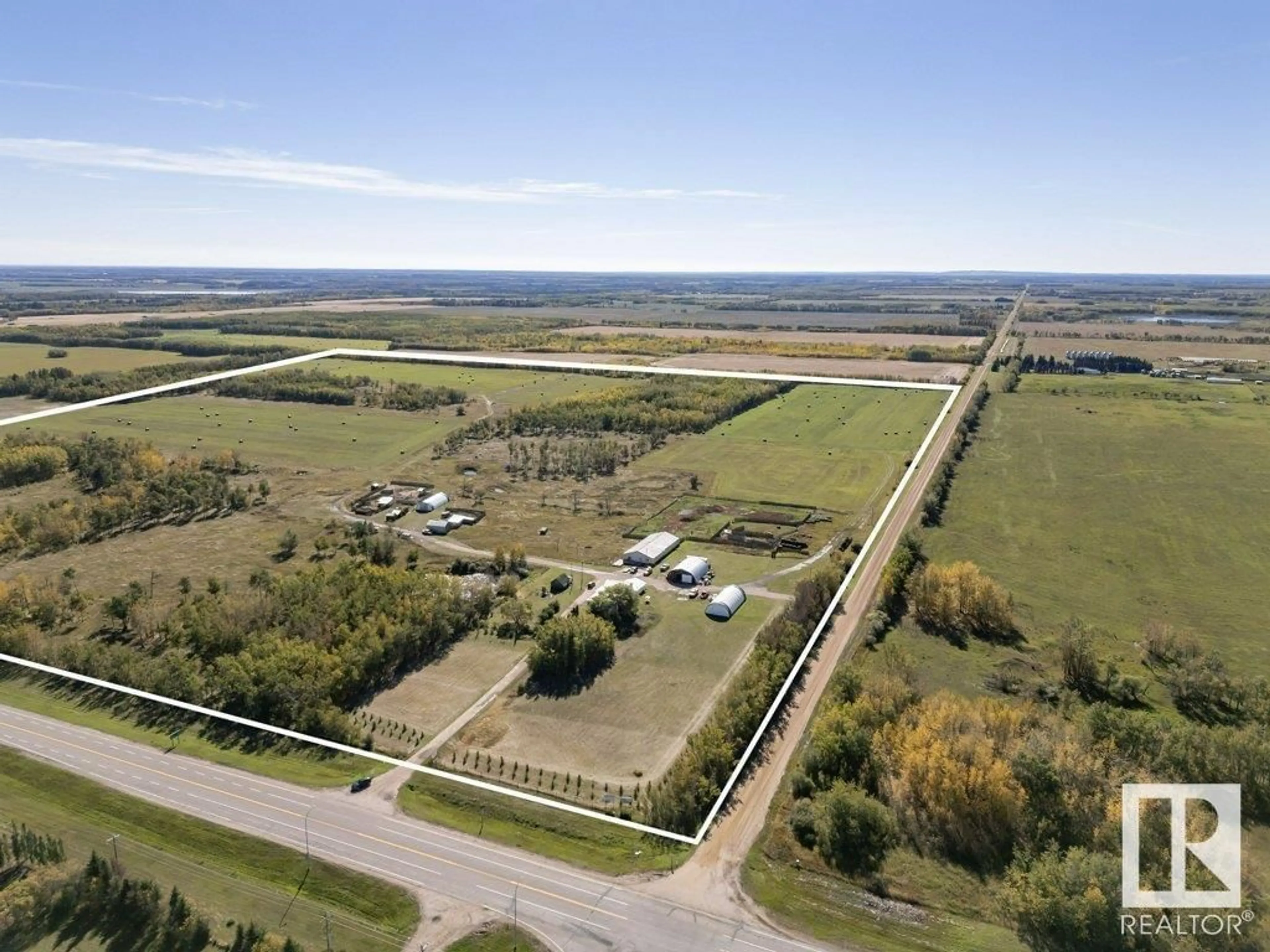 A pic from outside/outdoor area/front of a property/back of a property/a pic from drone, unknown for 14722 Hwy 28, Rural Smoky Lake County Alberta T0A3C0