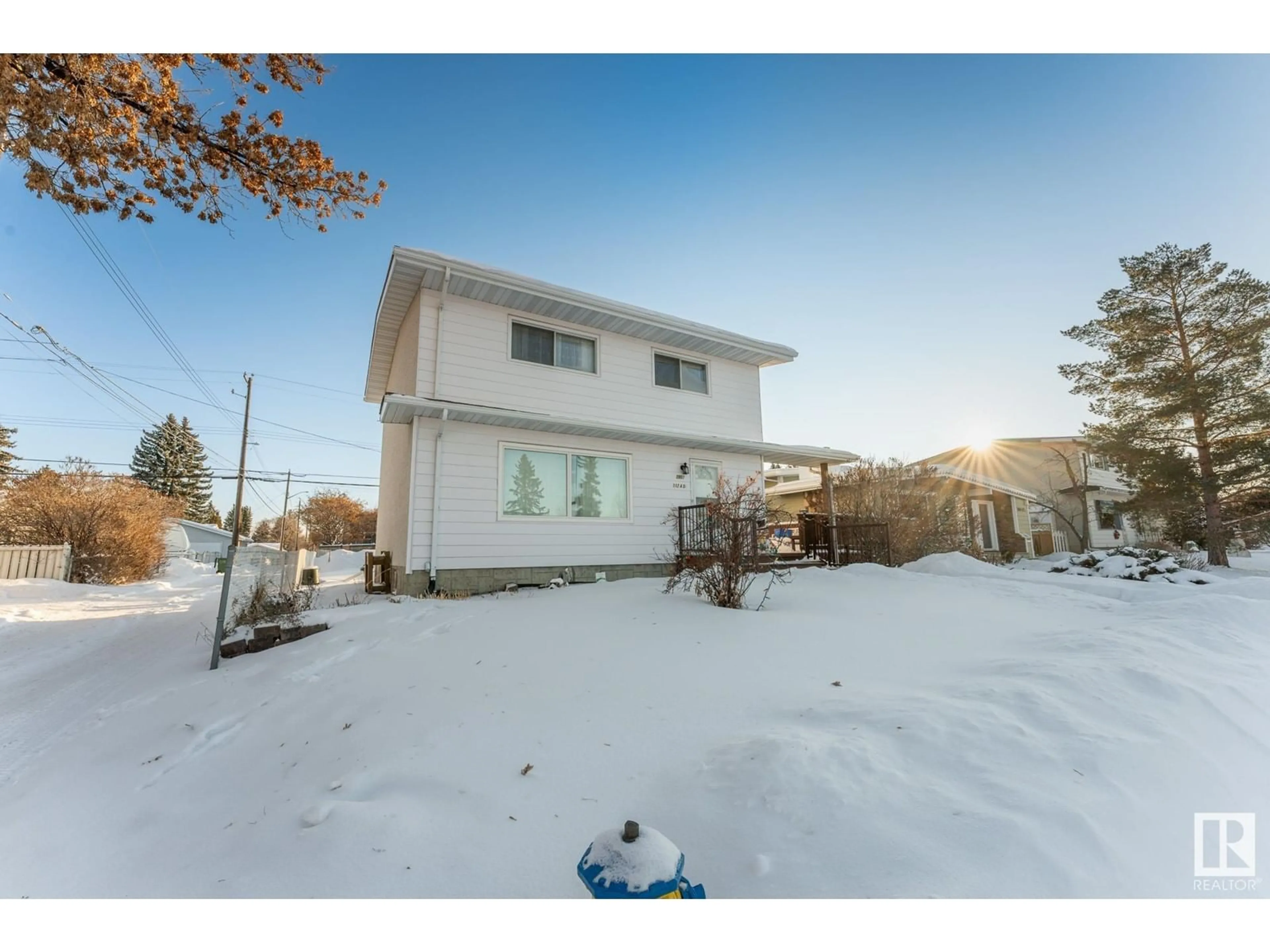 A pic from outside/outdoor area/front of a property/back of a property/a pic from drone, unknown for 3907 112A ST NW, Edmonton Alberta T6J1K4