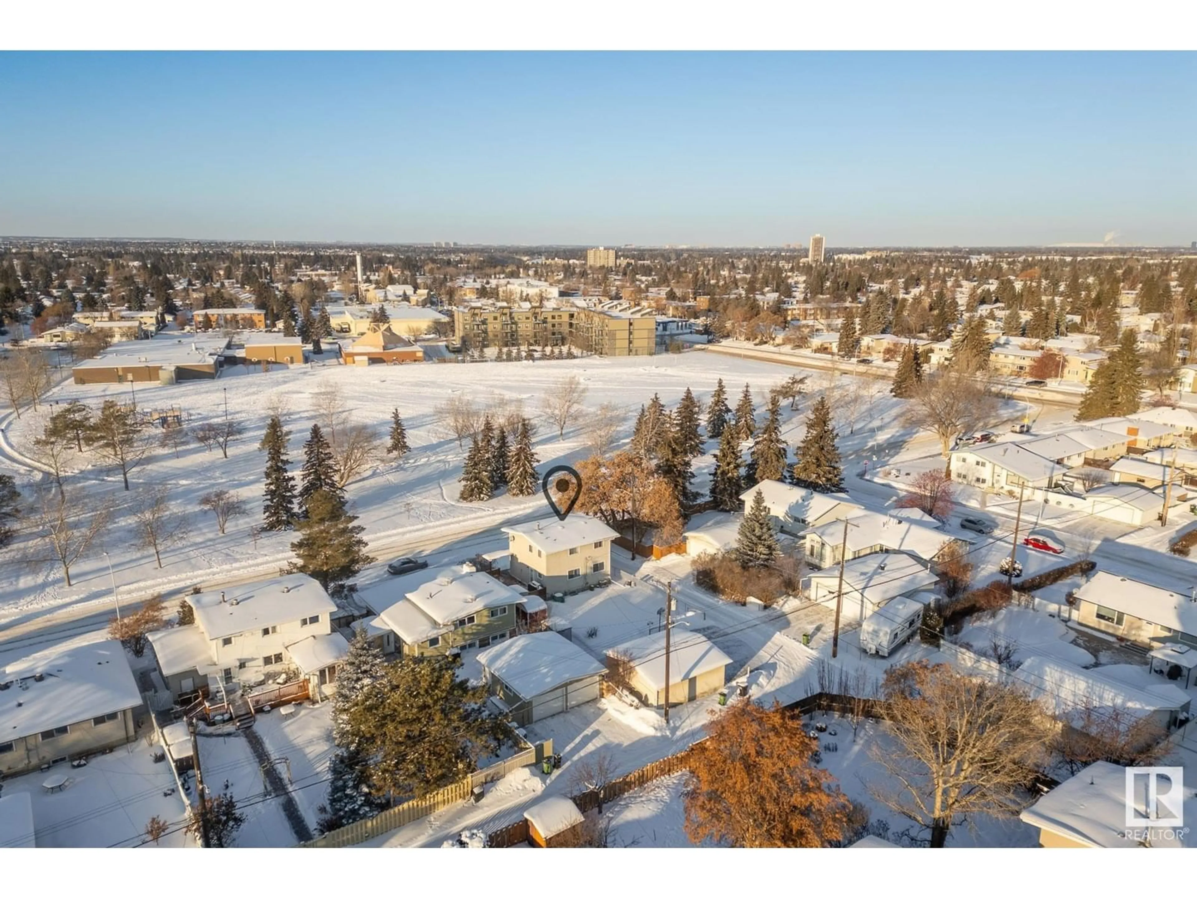 A pic from outside/outdoor area/front of a property/back of a property/a pic from drone, street for 3907 112A ST NW, Edmonton Alberta T6J1K4